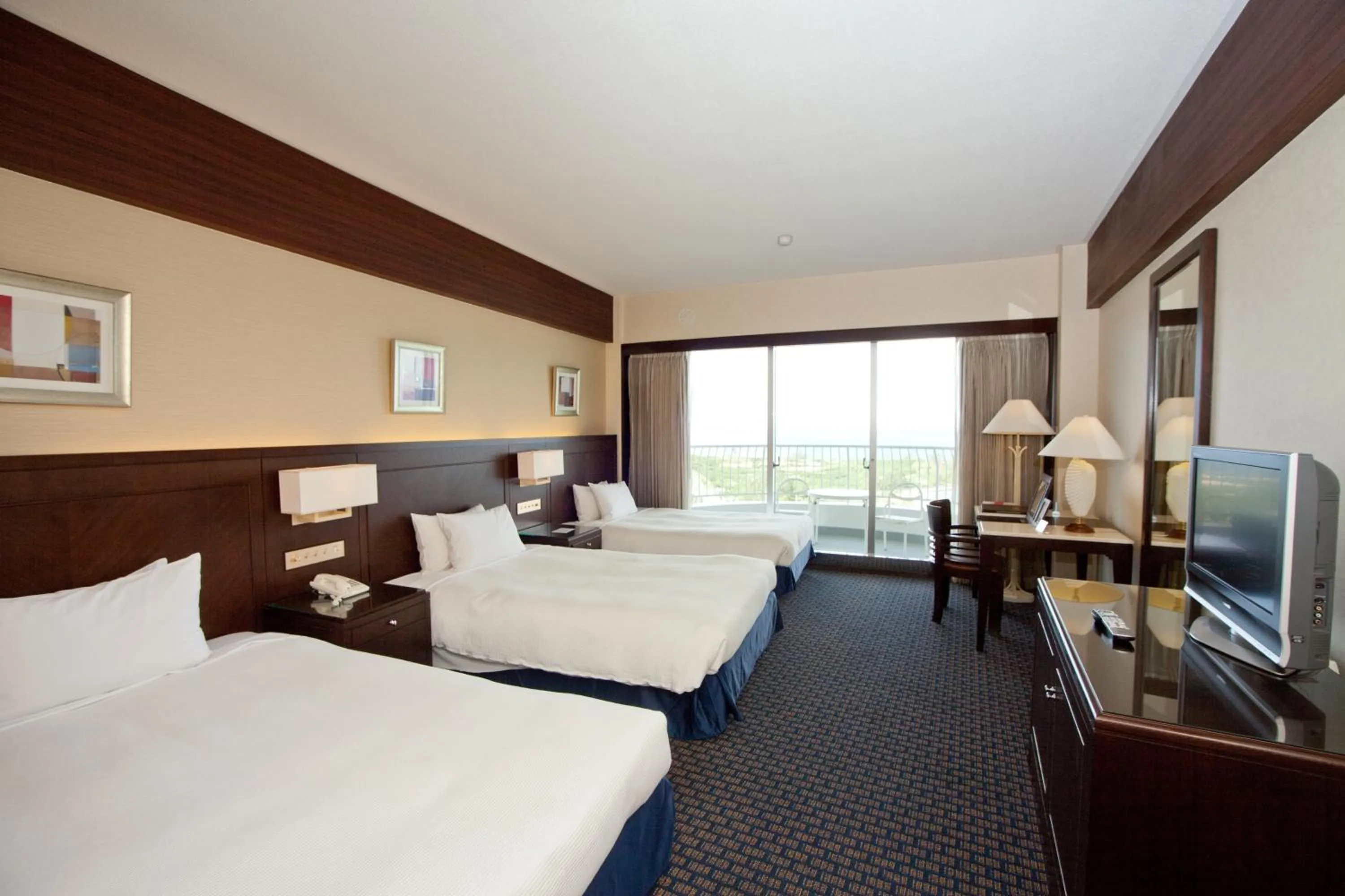 Living room, Bed in Okinawa Kariyushi Beach Resort Ocean Spa