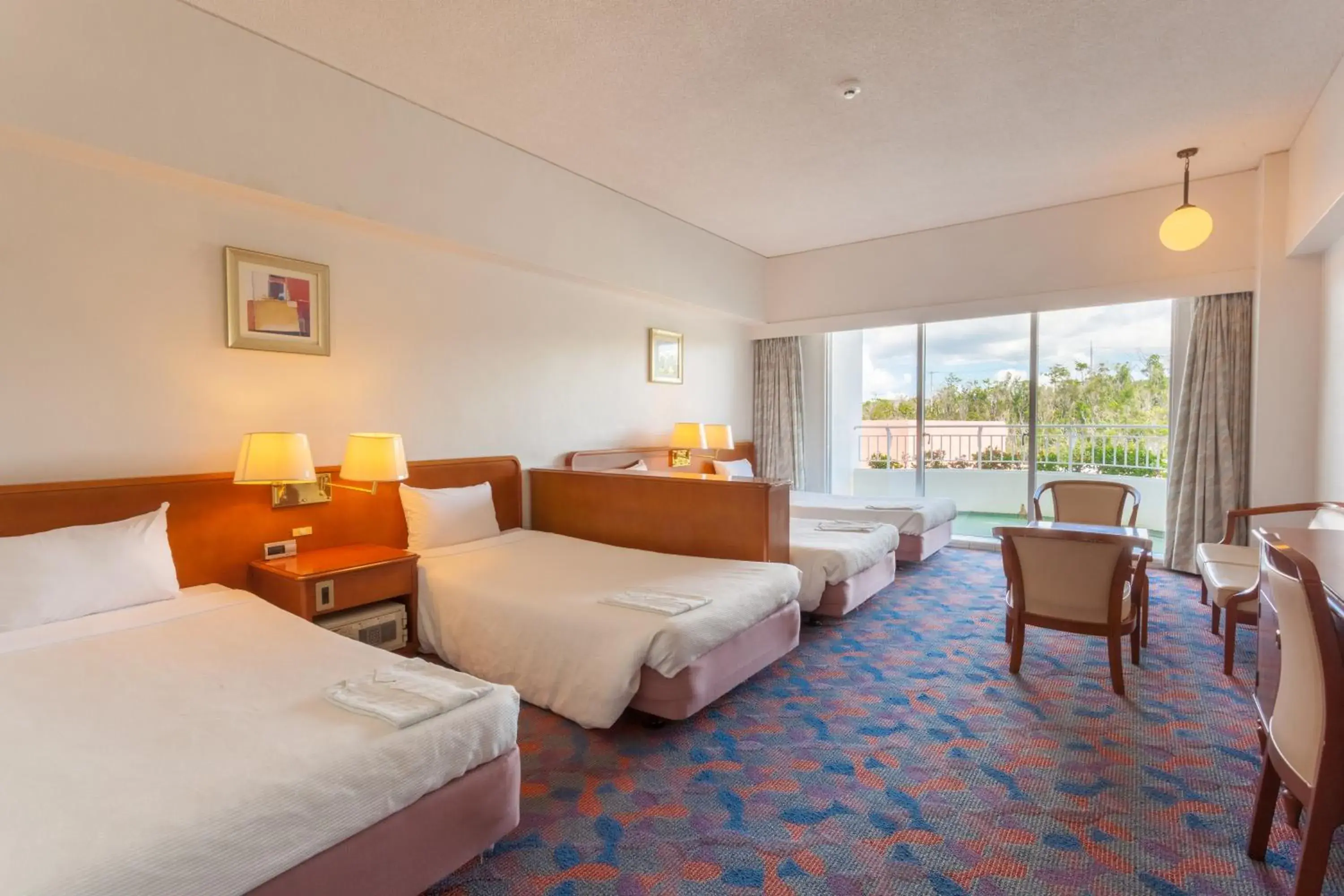 Bed in Okinawa Kariyushi Beach Resort Ocean Spa Bed in Okinawa Kariyushi Beach Resort Ocean Spa