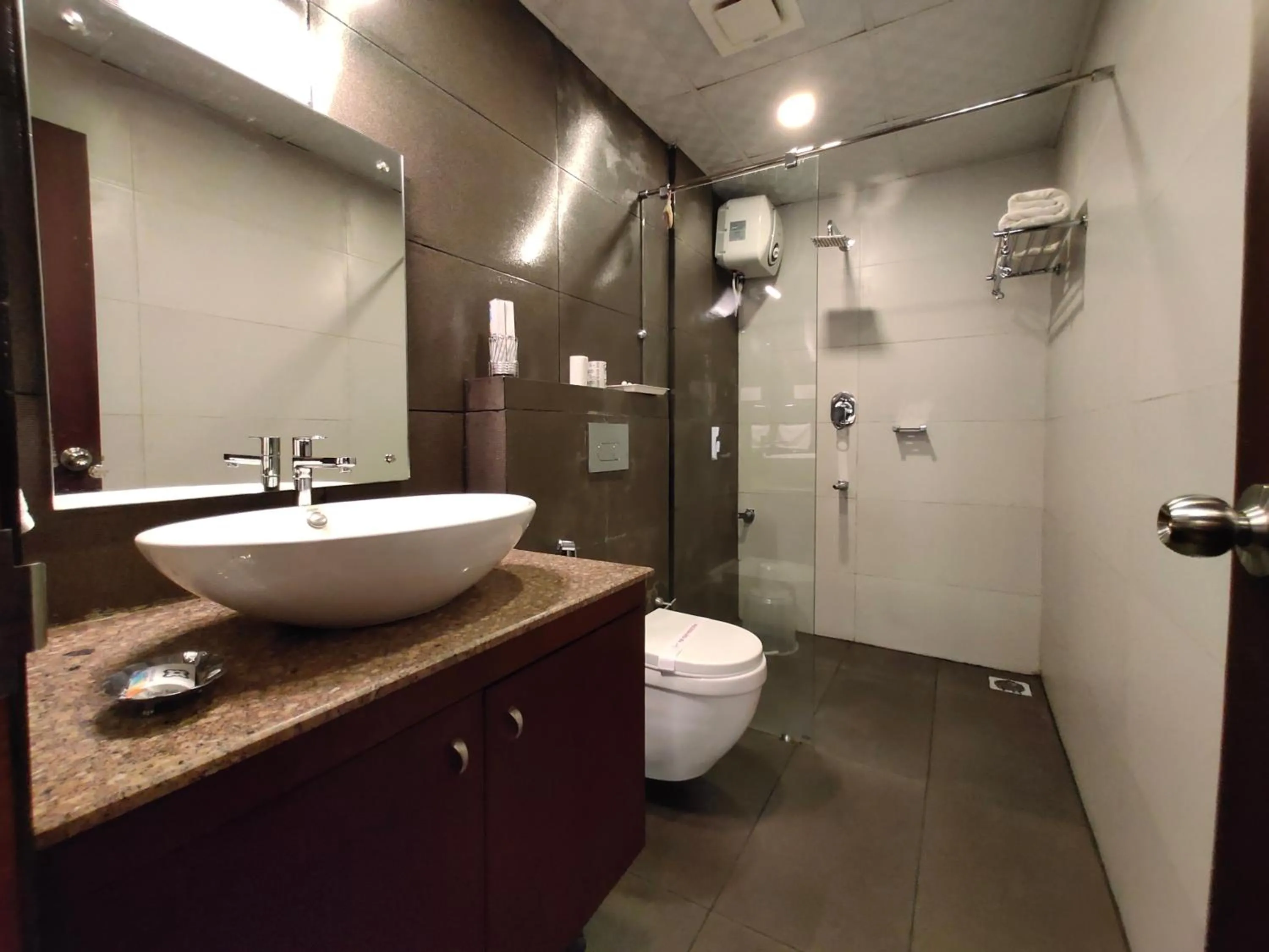 Shower in Four N Square Residency