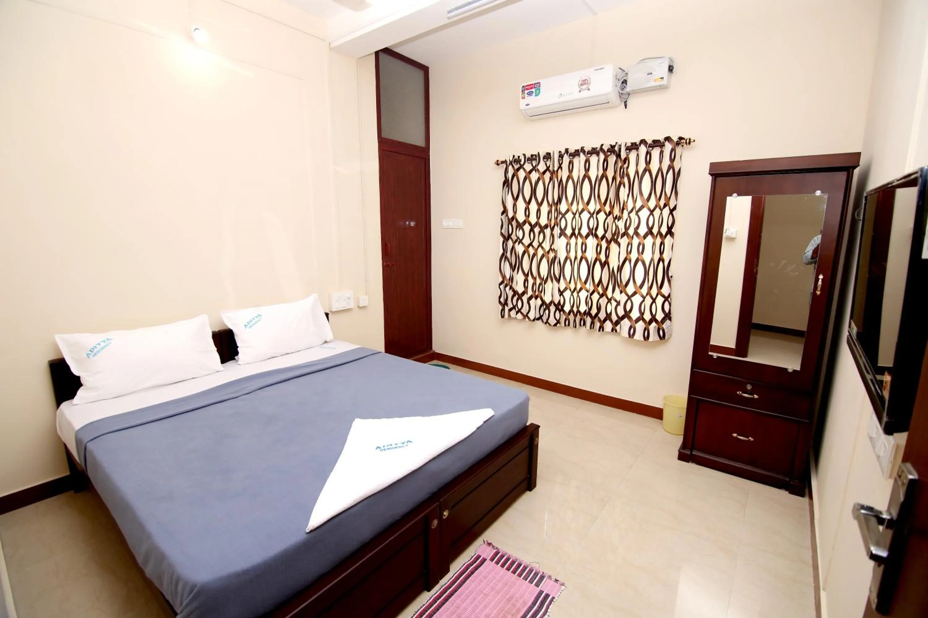 Photo of the whole room, Bed in Aditya Residency