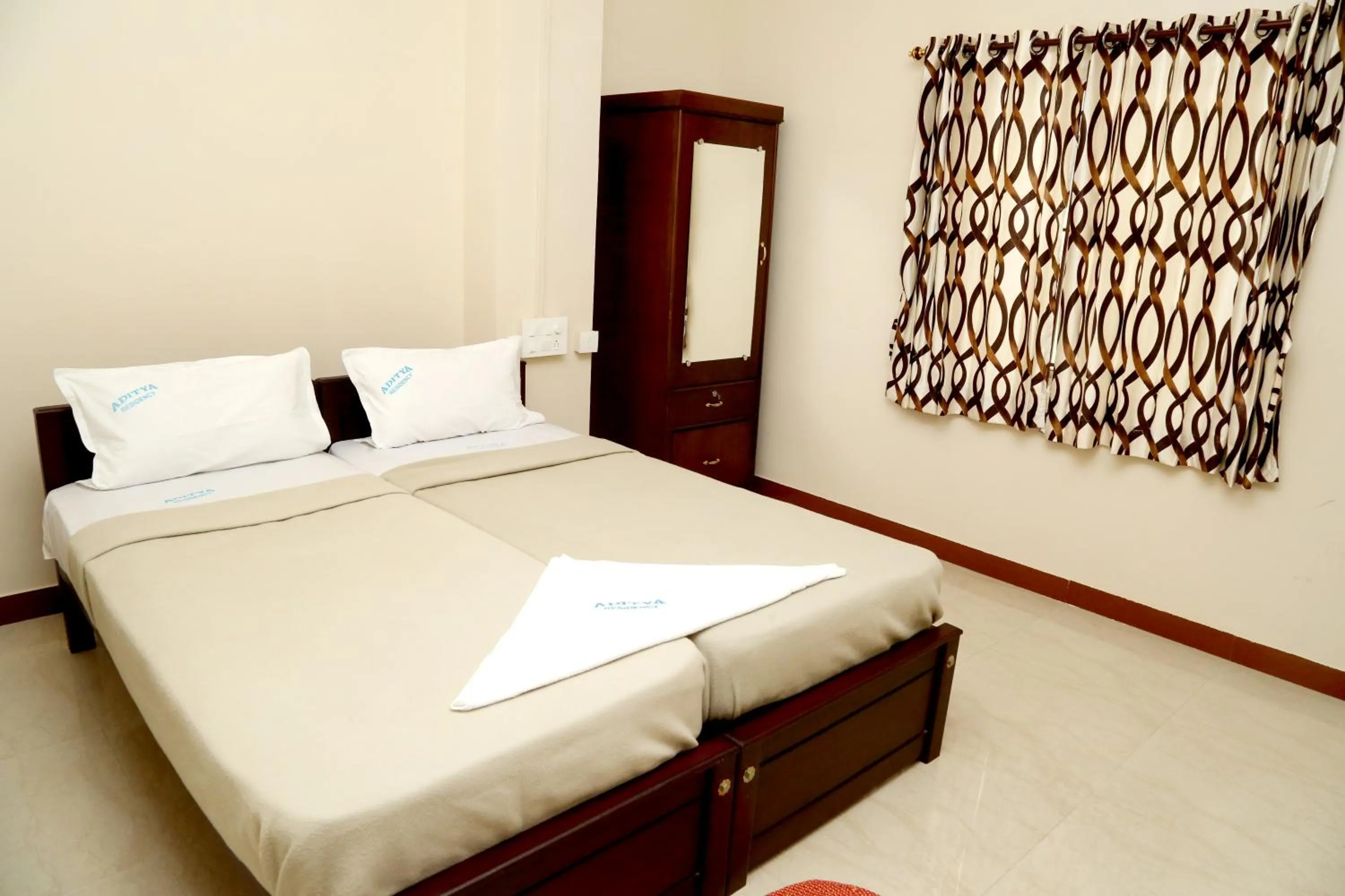 Photo of the whole room, Bed in Aditya Residency