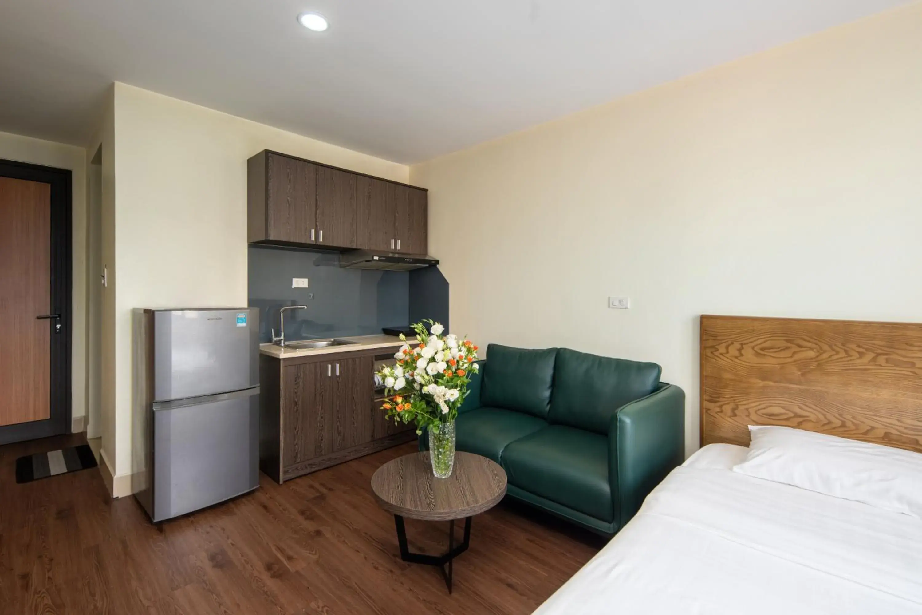 Kitchen or kitchenette, Bed in Granda Hanoi Hotel & Apartment Kitchen or kitchenette, Bed in Granda Hanoi Hotel & Apartment
