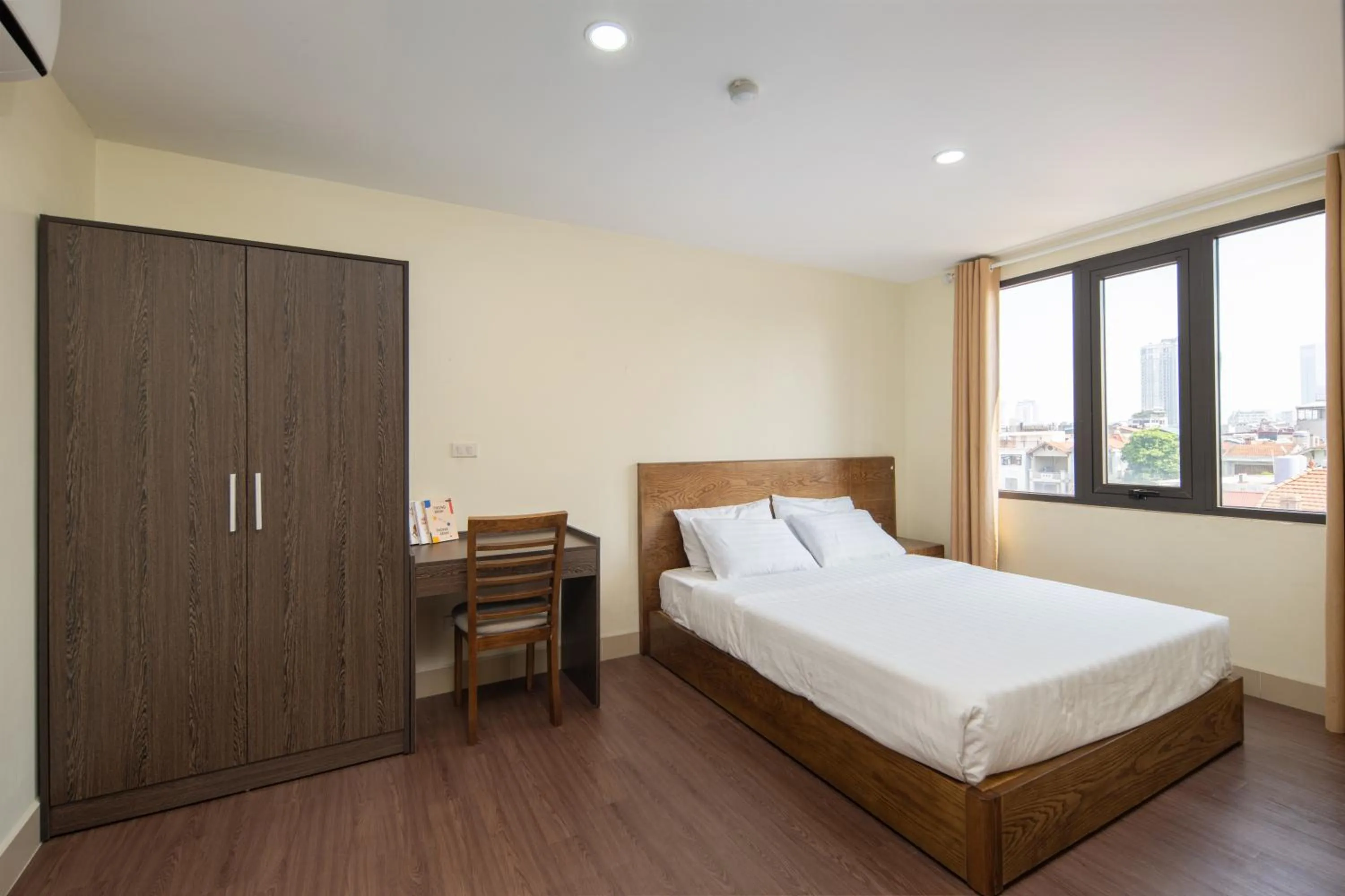 Bed in Granda Hanoi Hotel & Apartment