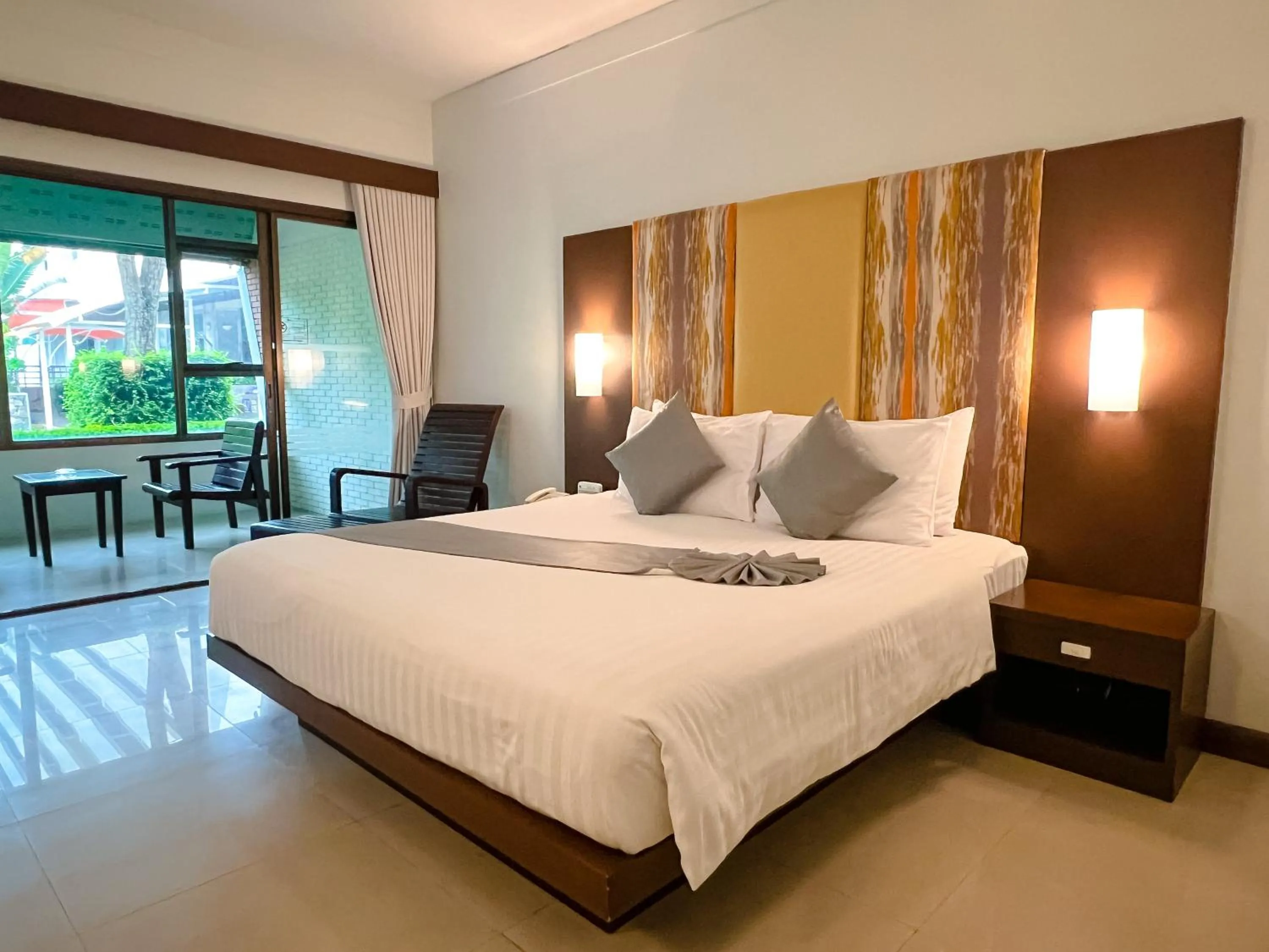 Bed in Patong Resort Hotel - SHA Extra Plus