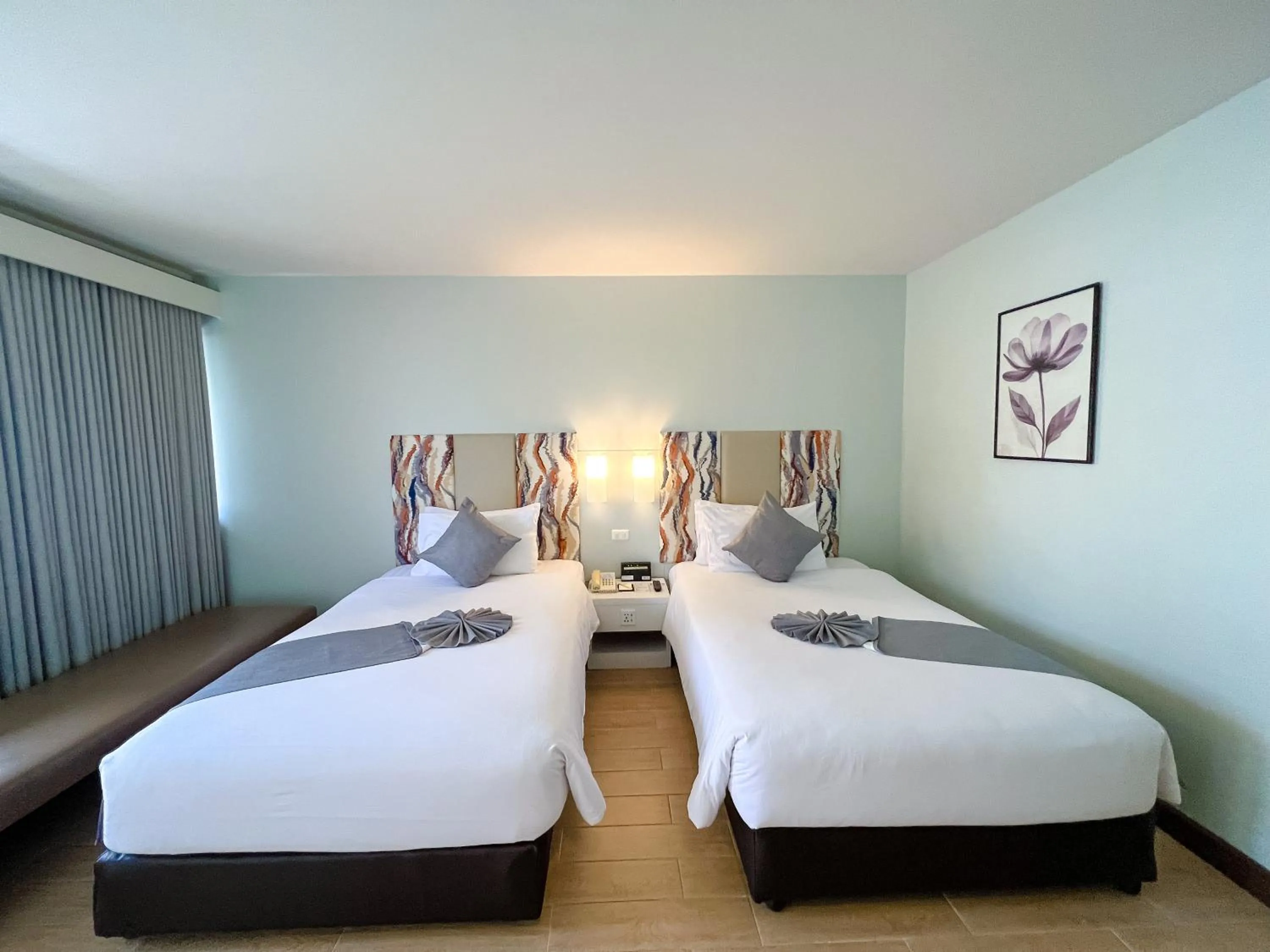 Bed in Patong Resort Hotel - SHA Extra Plus