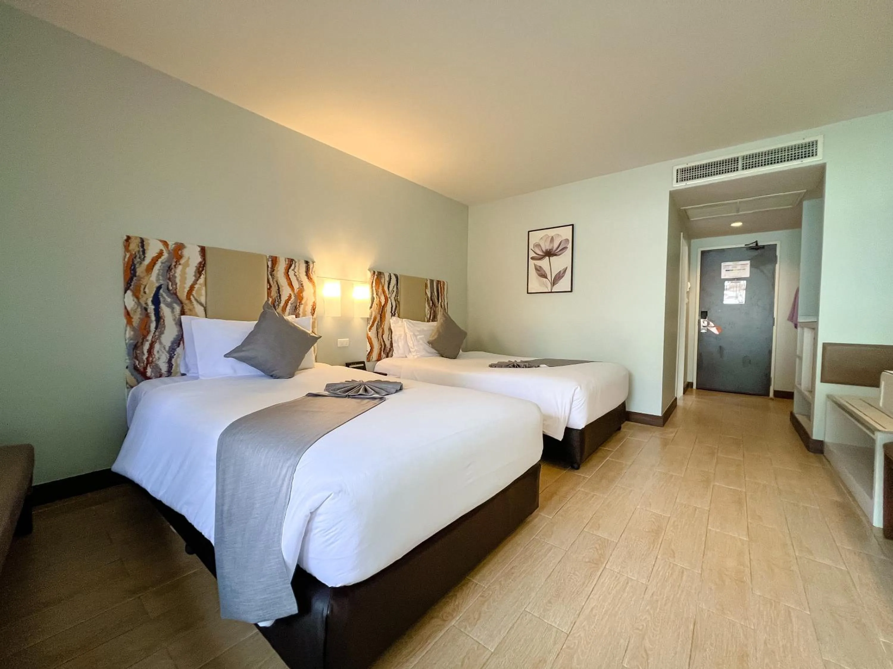 Bed in Patong Resort Hotel - SHA Extra Plus