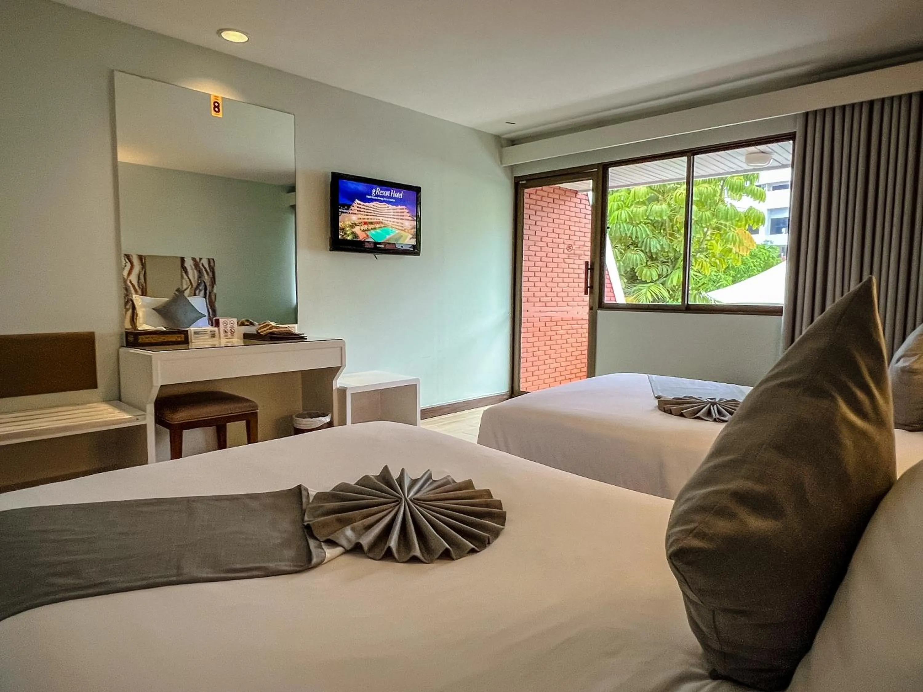 Bed in Patong Resort Hotel - SHA Extra Plus