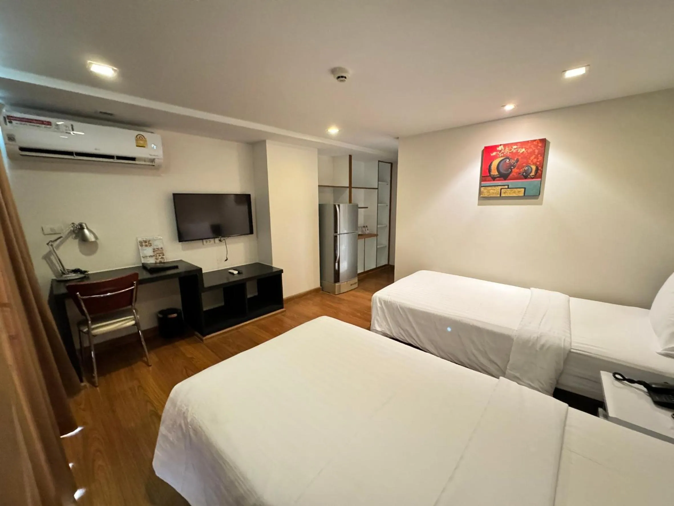 Bed in I Residence Hotel Sathorn