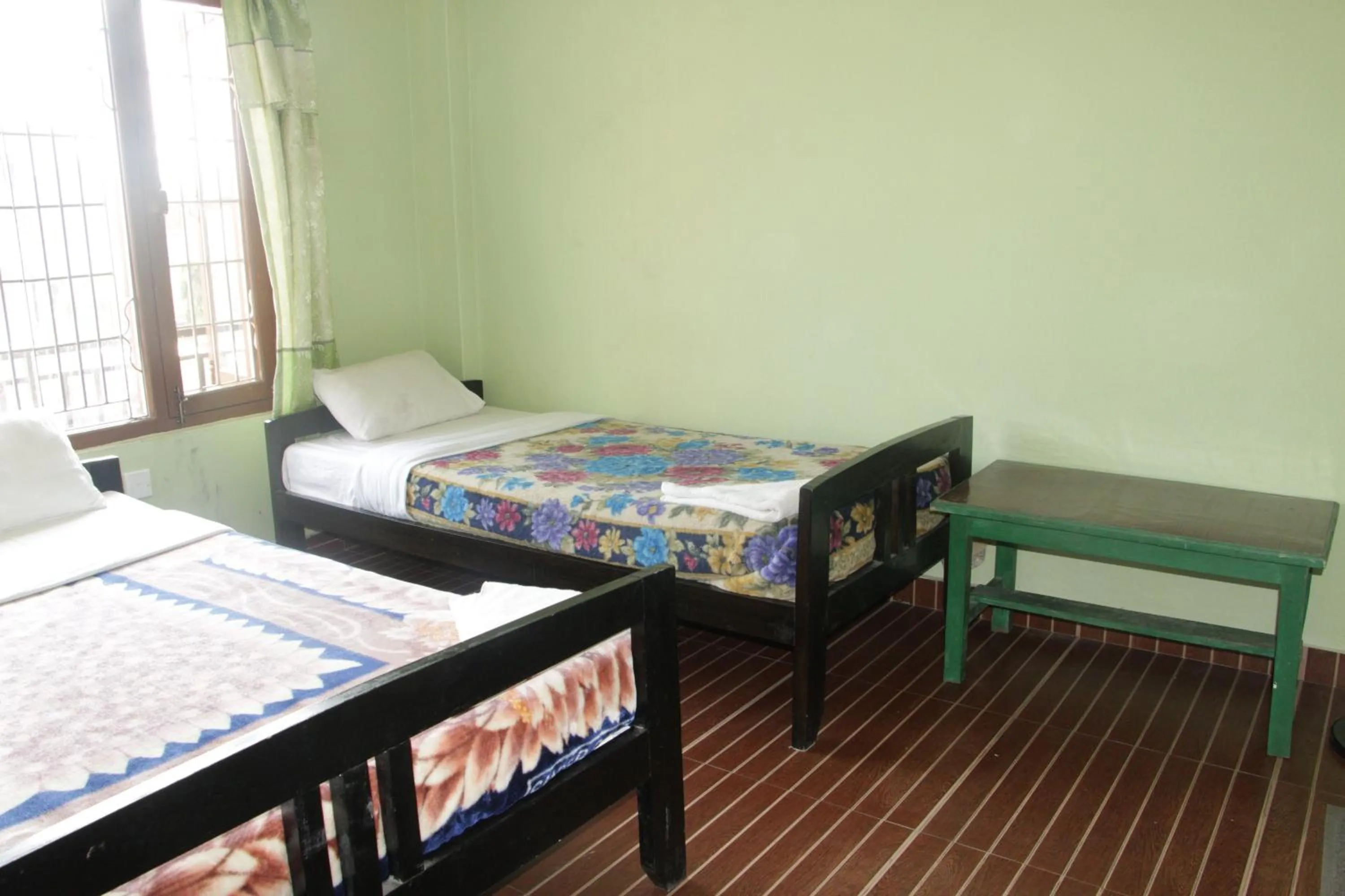 Bedroom, Bed in Harry Guest House & Restaurant