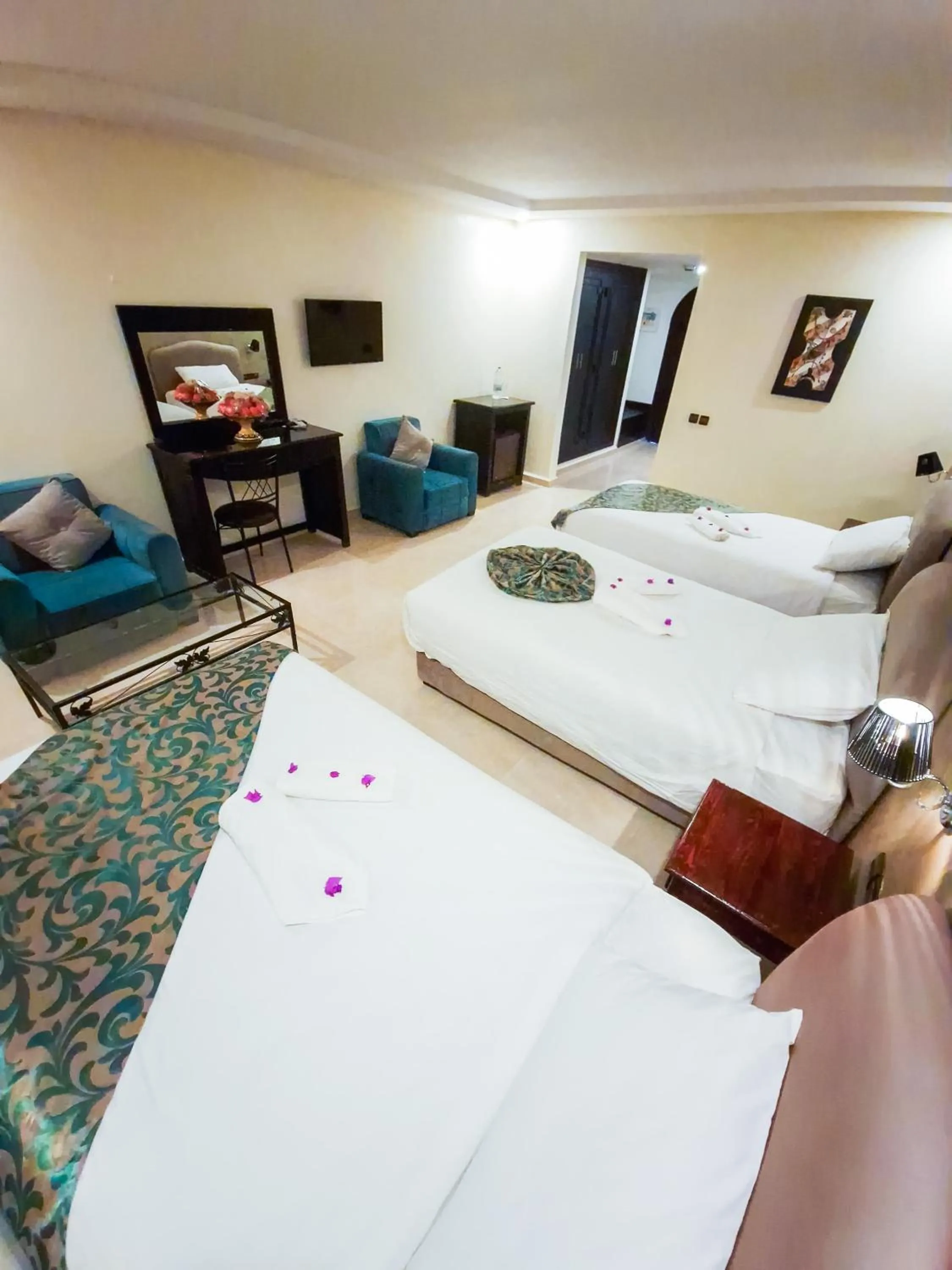 Bed in Palm's Hotel Club