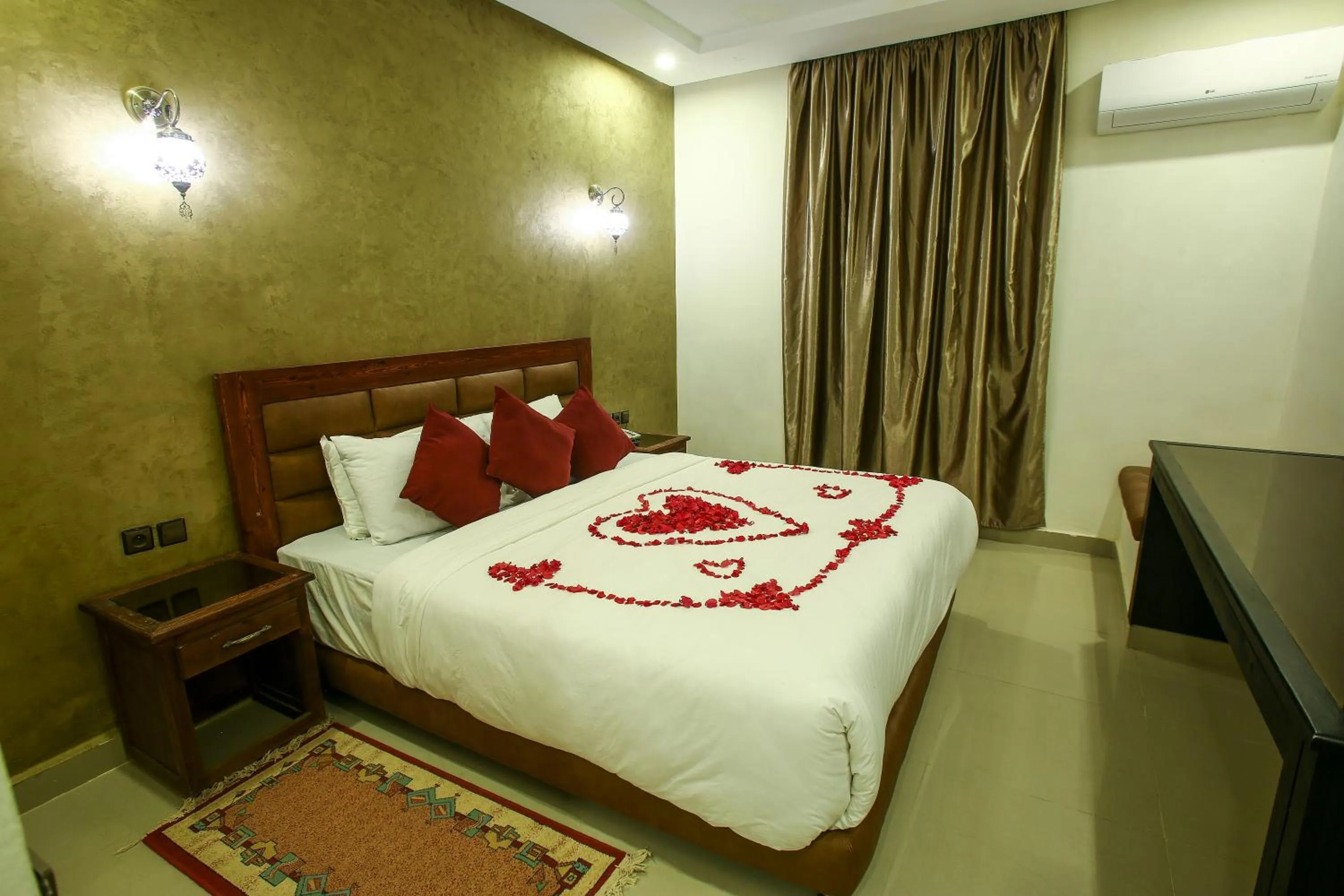 Bed in Palm's Hotel Club