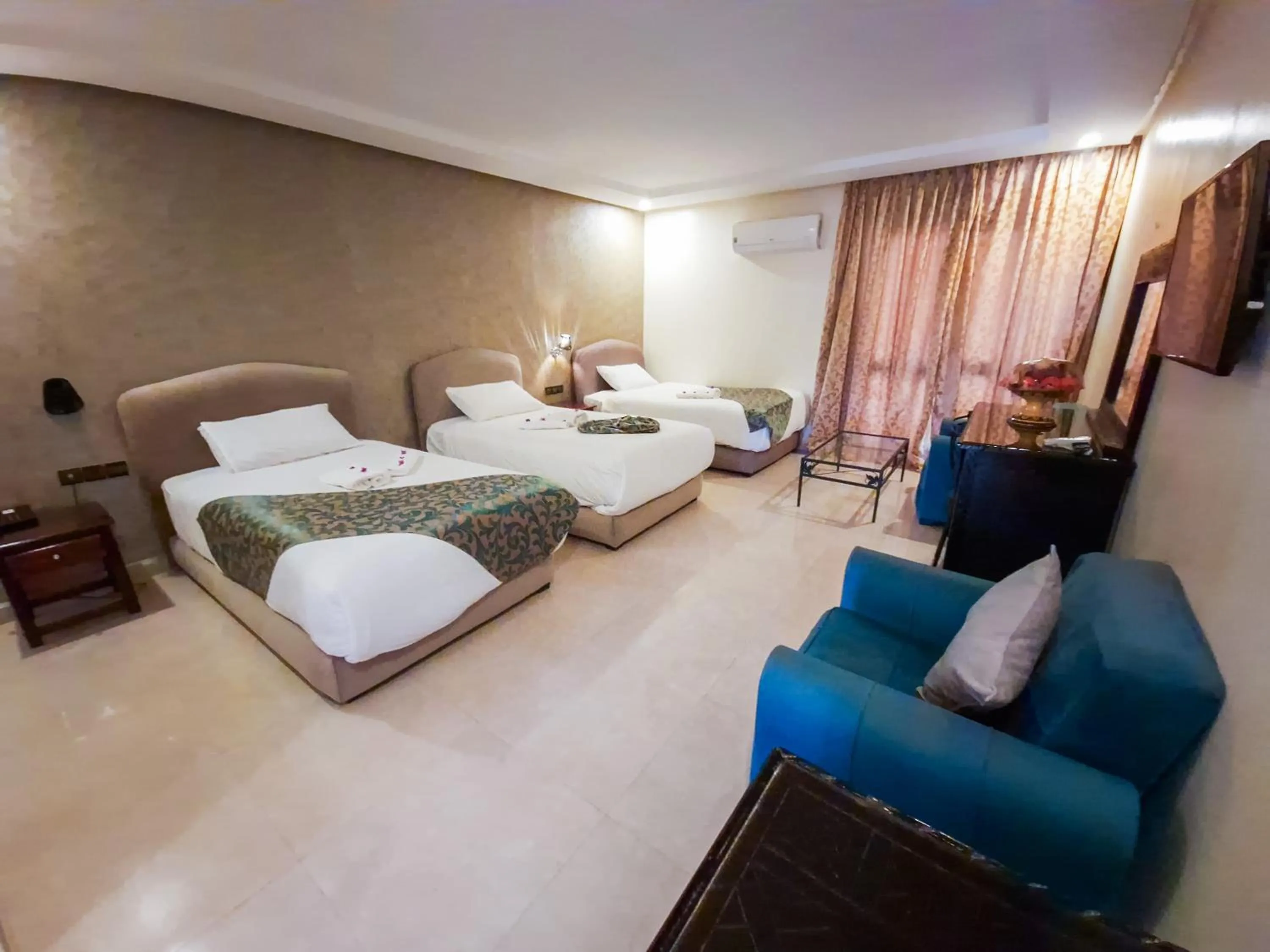 Bed in Palm's Hotel Club