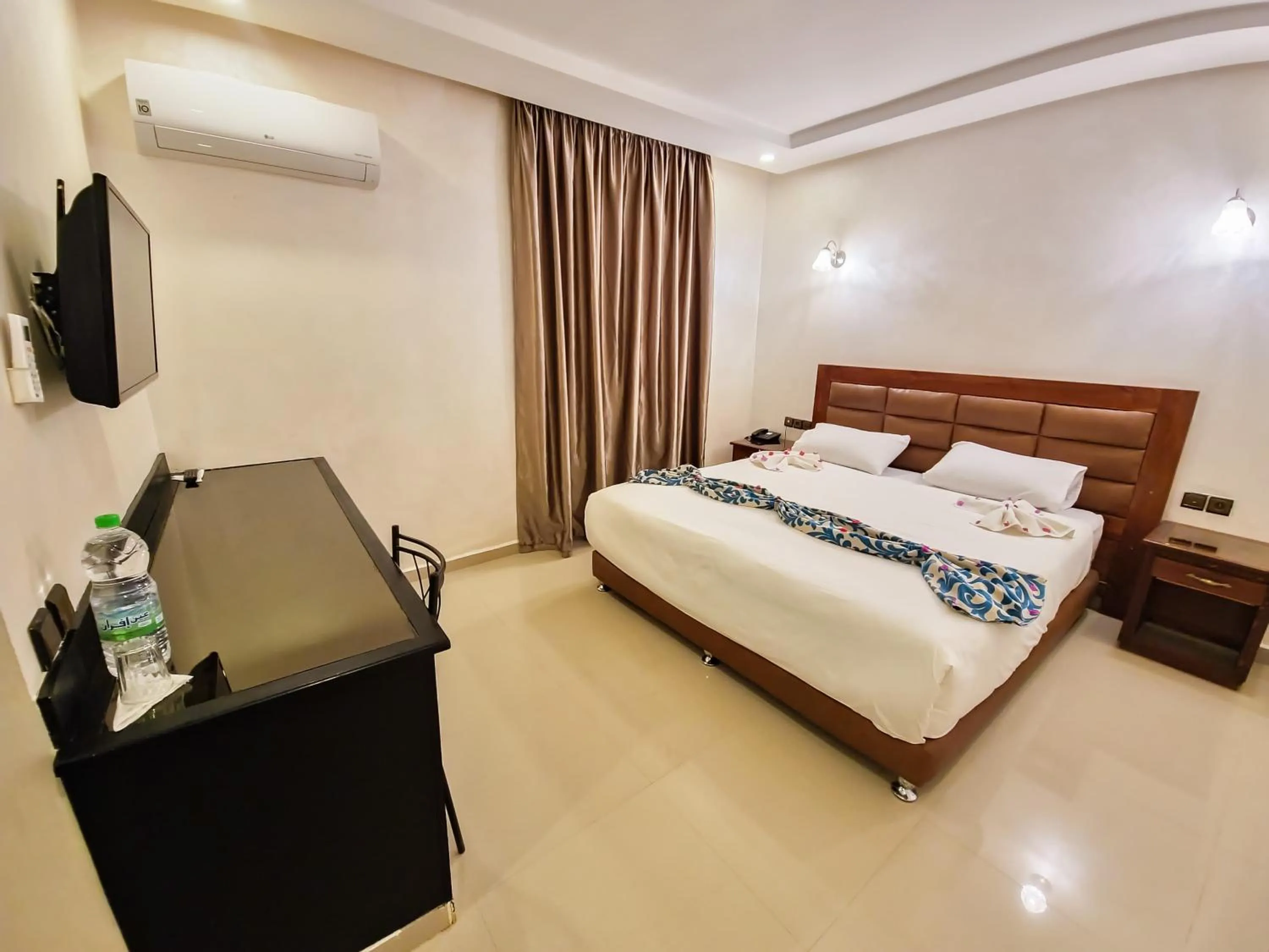 Bed in Palm's Hotel Club