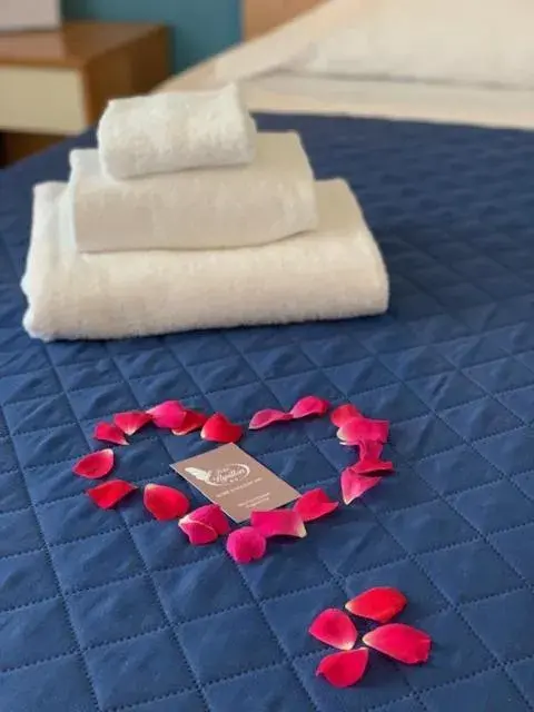 Bed in Albergo Papillon Bed in Albergo Papillon