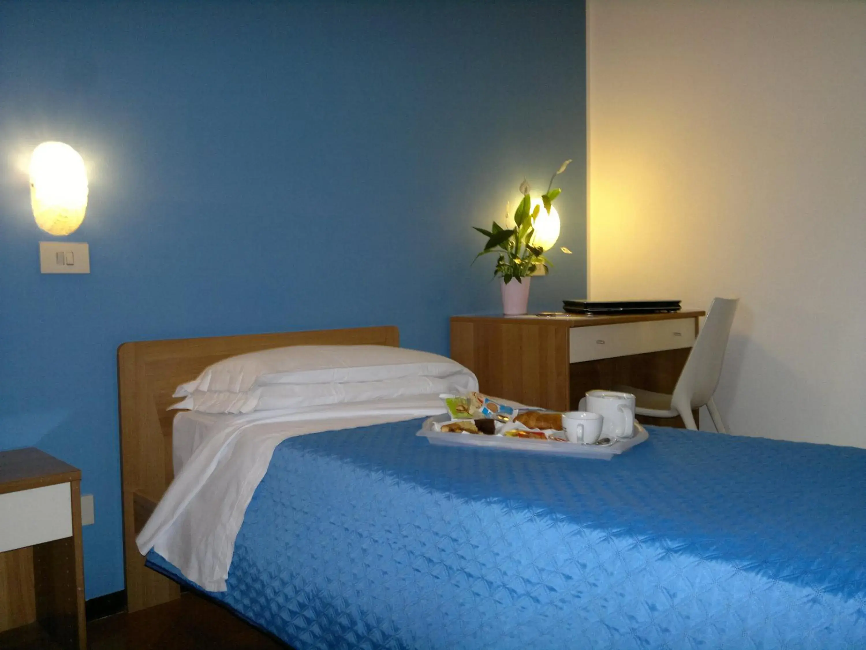 Bed in Albergo Papillon Bed in Albergo Papillon