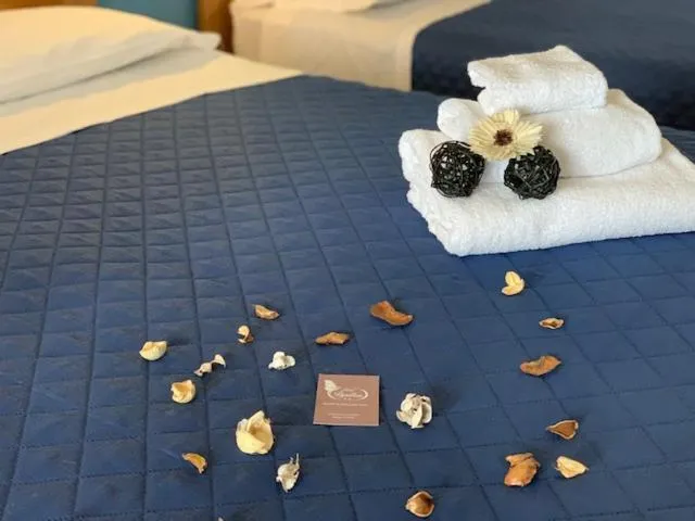 Bed in Albergo Papillon