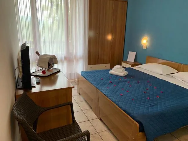 Bed in Albergo Papillon