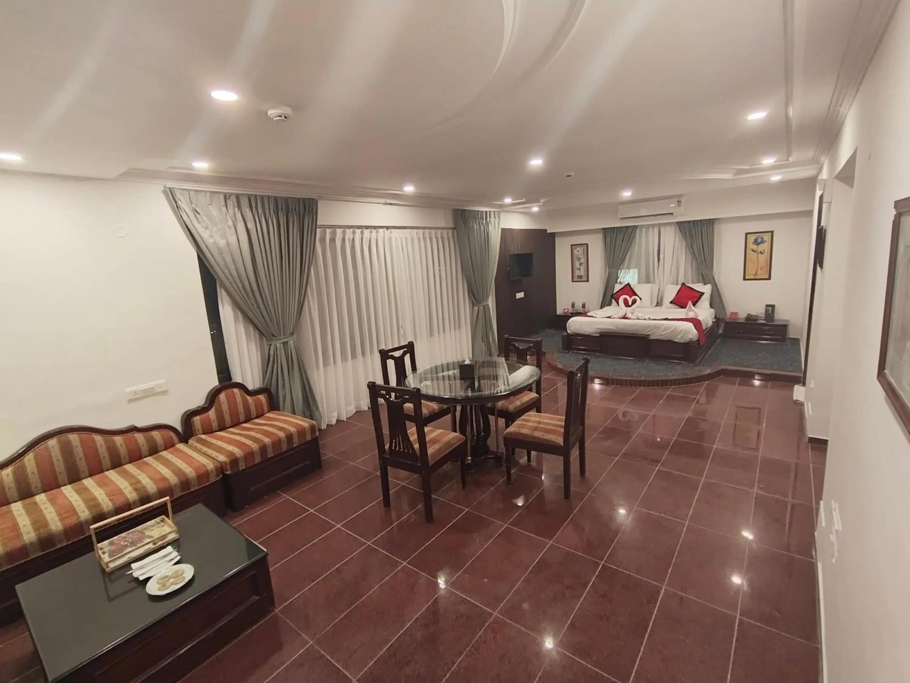 Photo of the whole room, Bed in Spree Hotel Rajkot