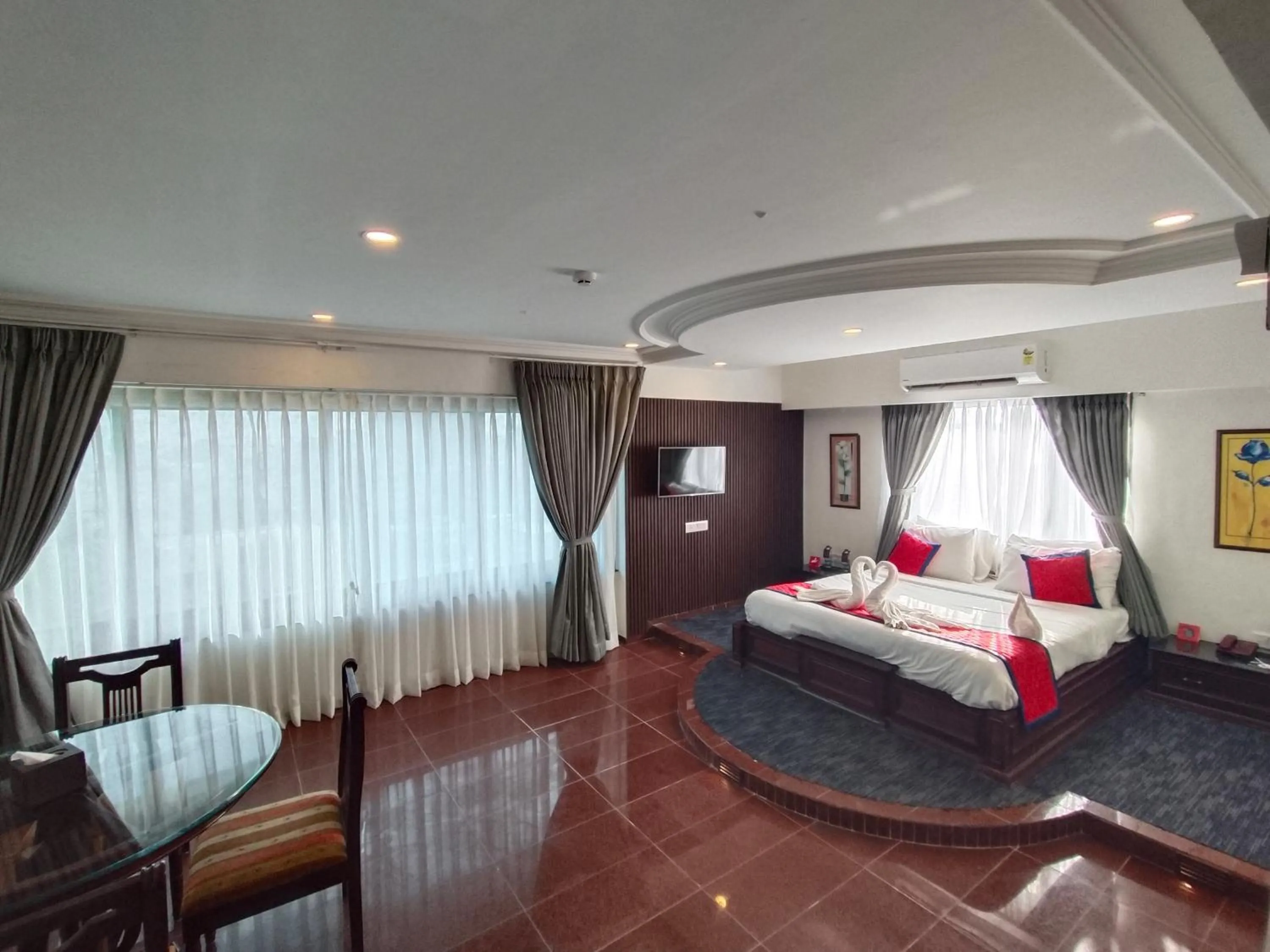 Photo of the whole room, Bed in Spree Hotel Rajkot