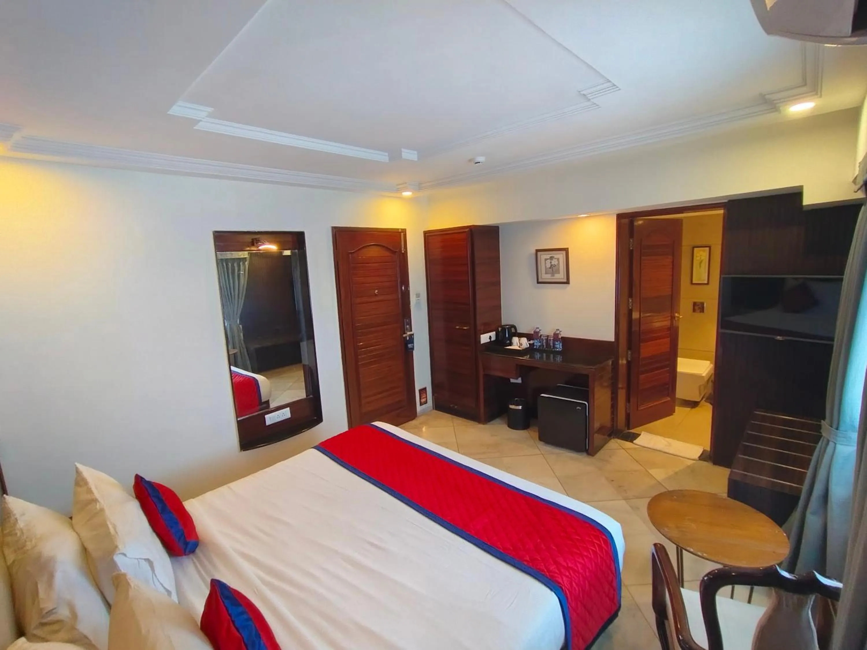 Photo of the whole room, Bed in Spree Hotel Rajkot