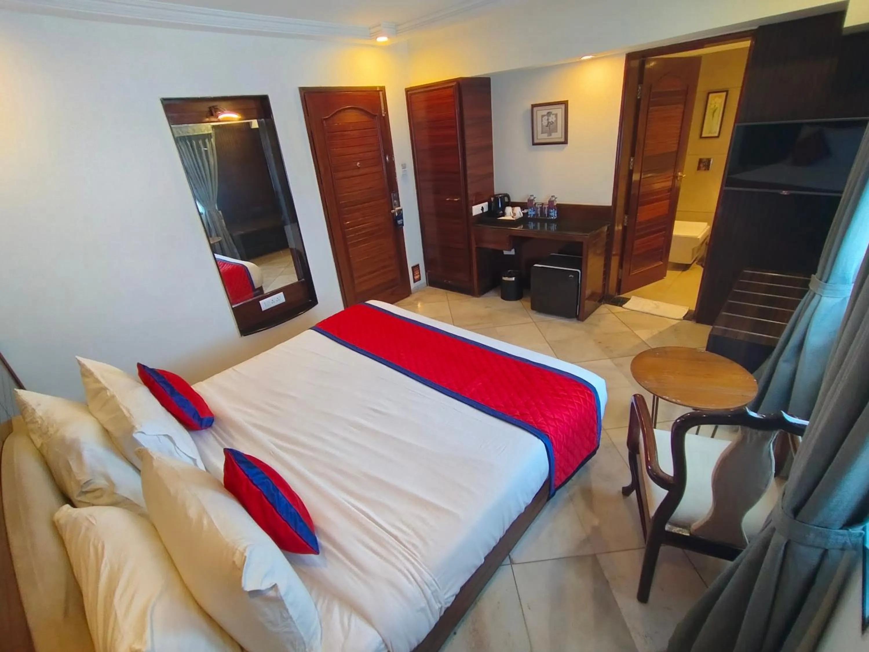 Photo of the whole room, Bed in Spree Hotel Rajkot