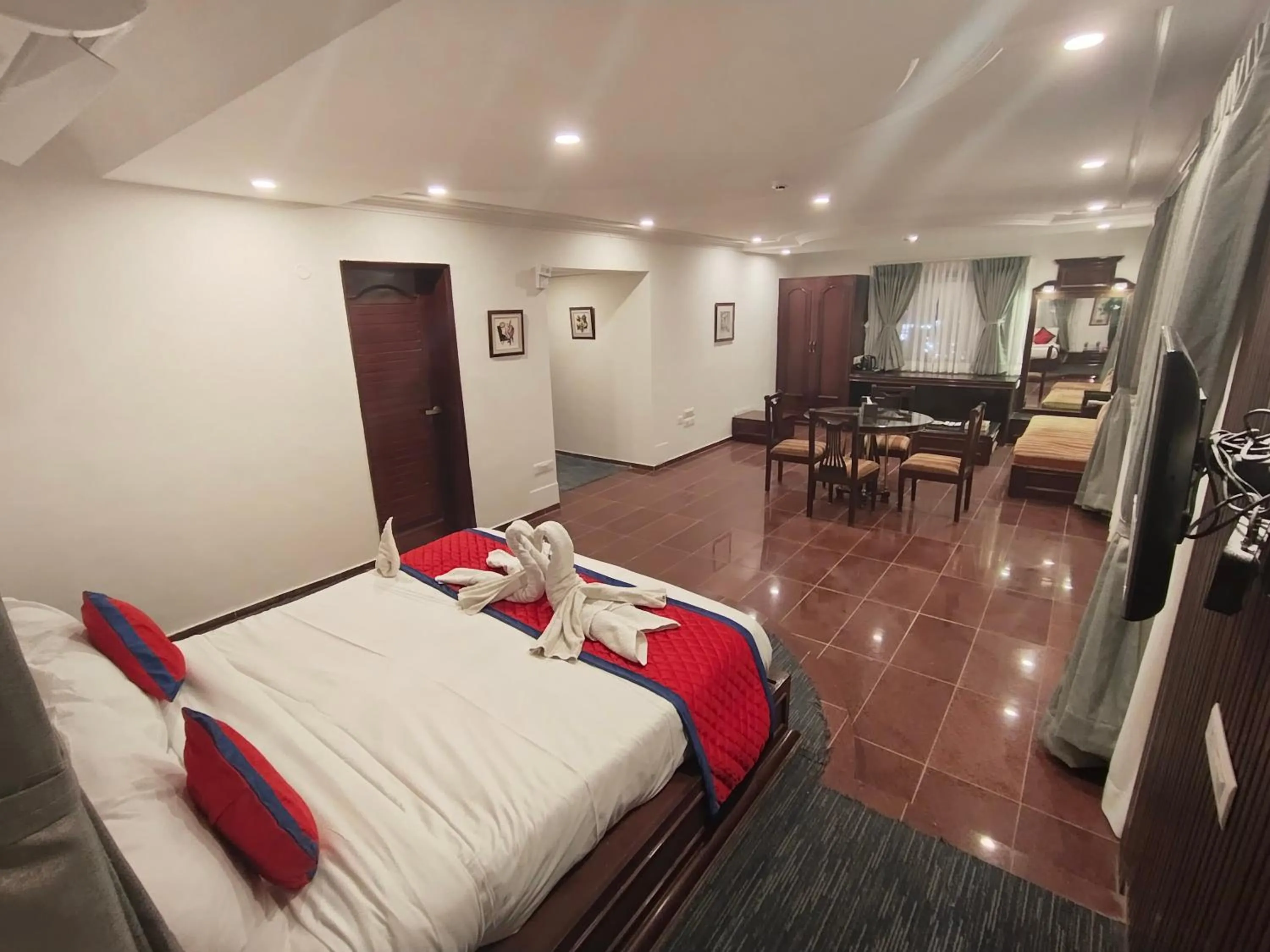 Photo of the whole room, Bed in Spree Hotel Rajkot