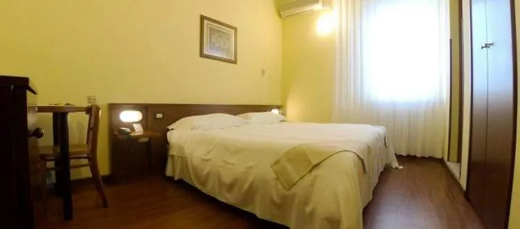 Bed in Hotel Mariani