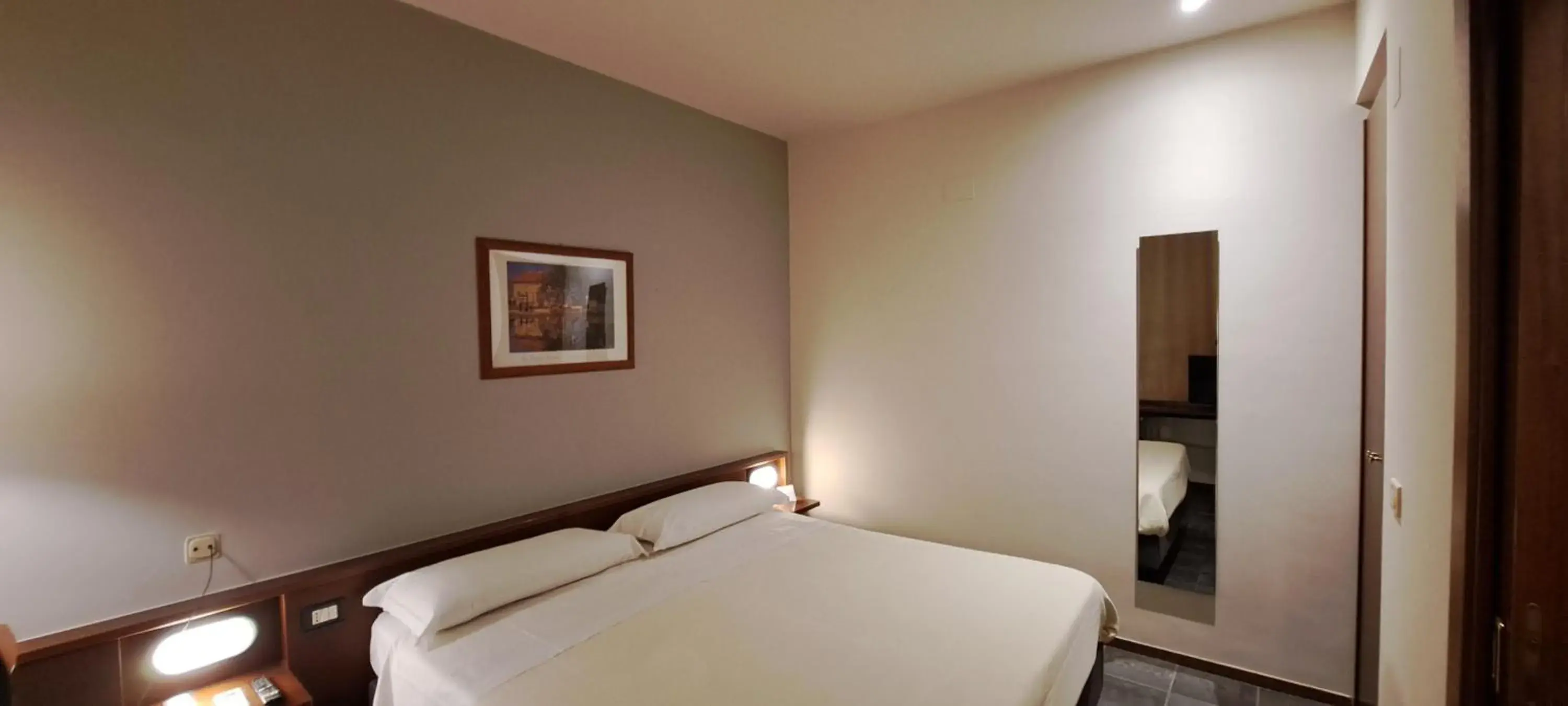 Bed in Hotel Mariani Bed in Hotel Mariani