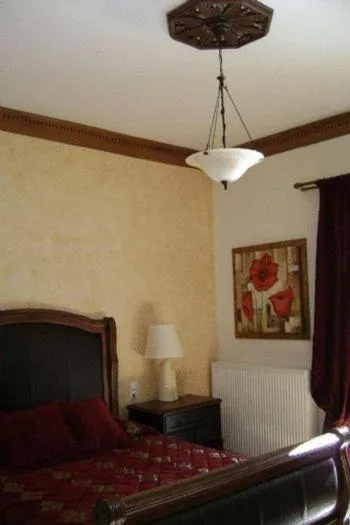 Bed in Margit Suites Hotel