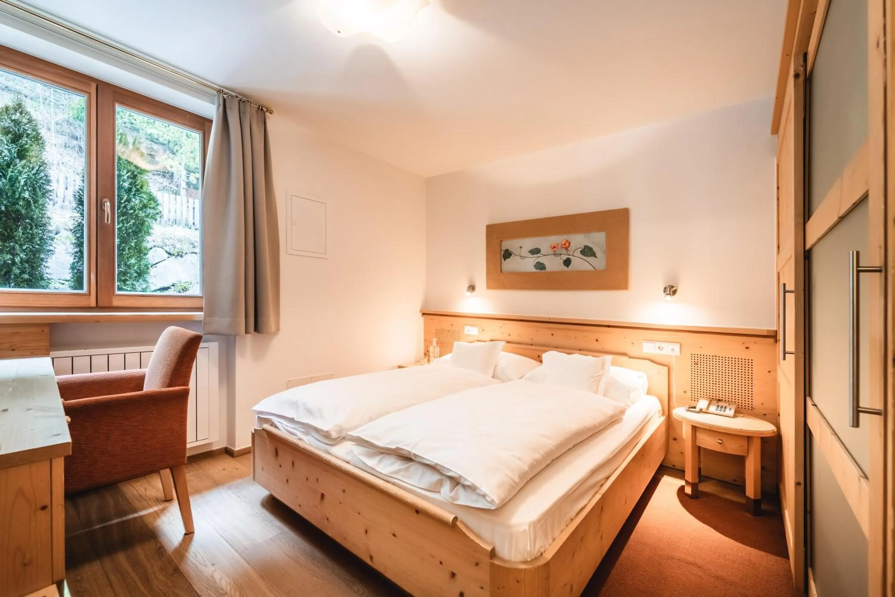 Photo of the whole room, Bed in Naturhotel Leitlhof