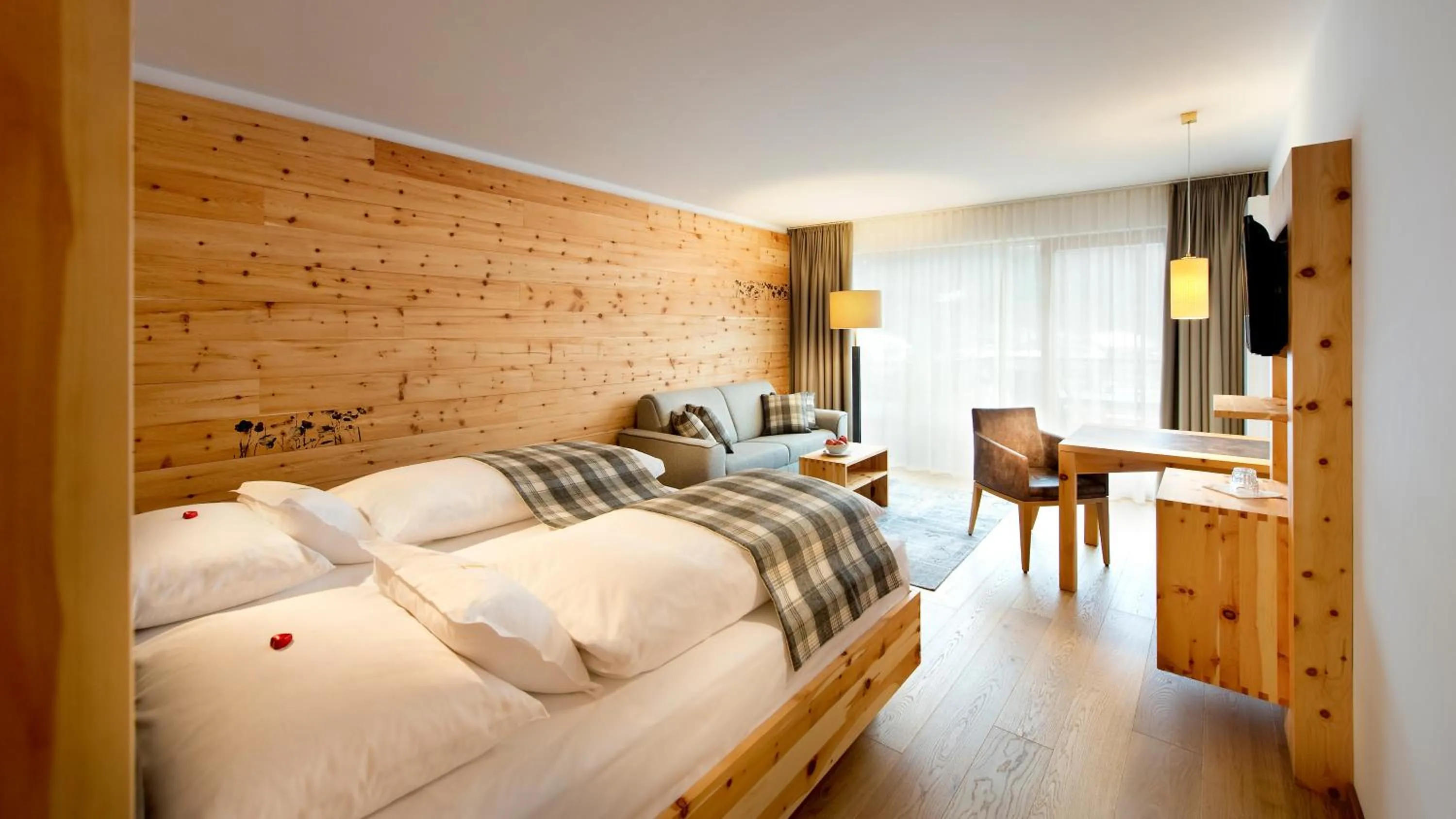 Photo of the whole room, Bed in Naturhotel Leitlhof