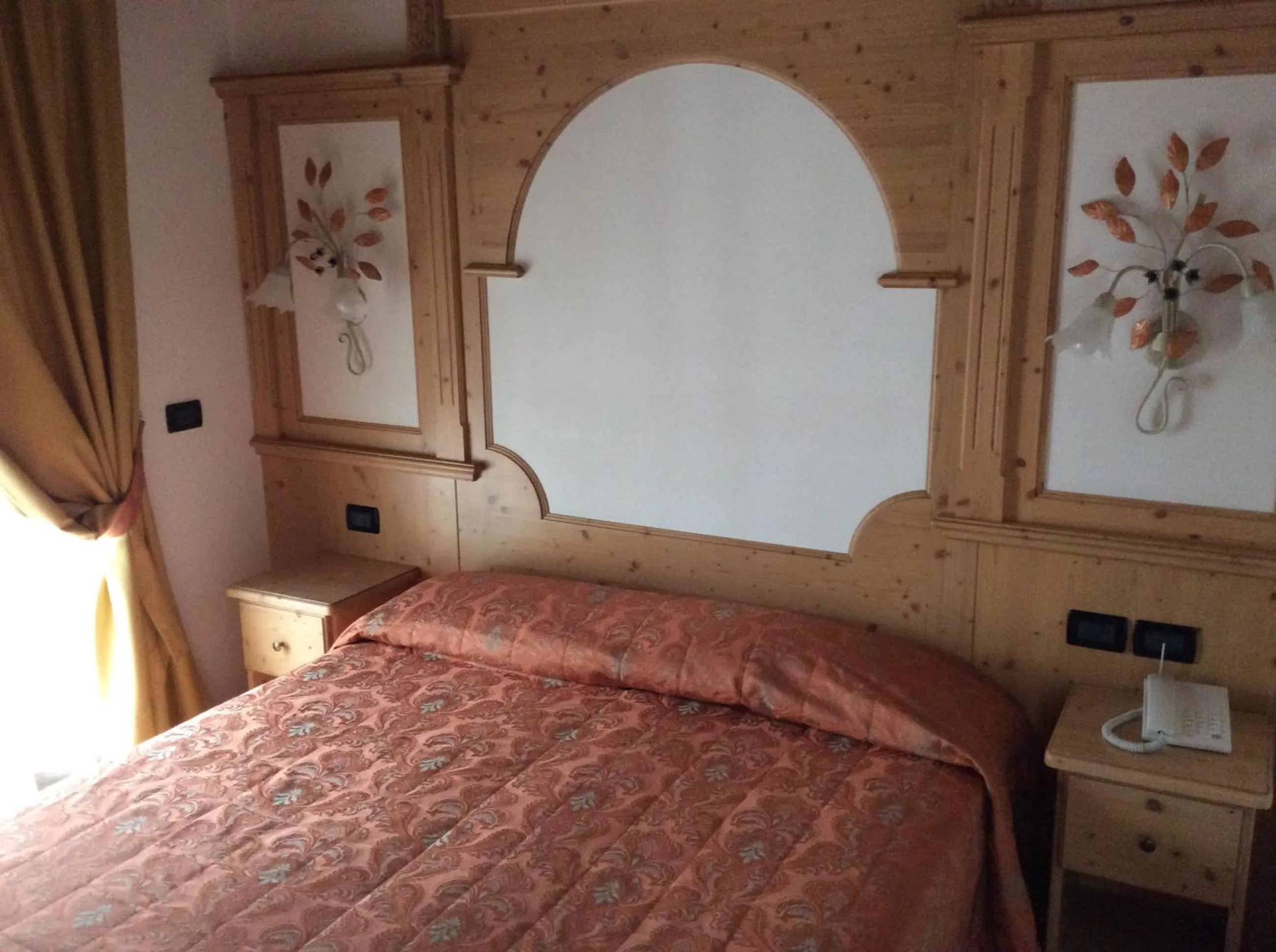 Decorative detail, Bed in Residence Garnì Il Giglio