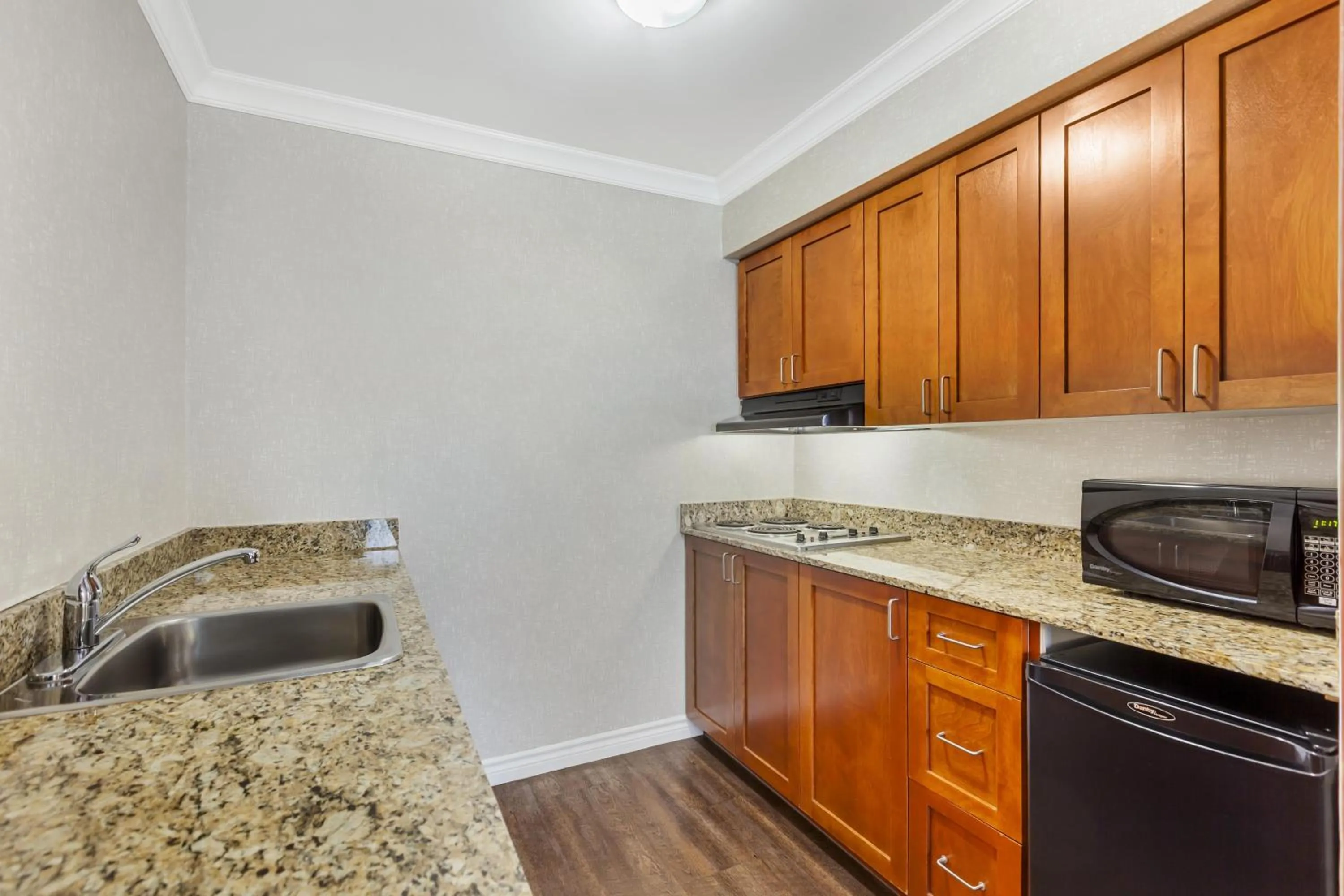 Bedroom in Best Western Plus Rose City Suites