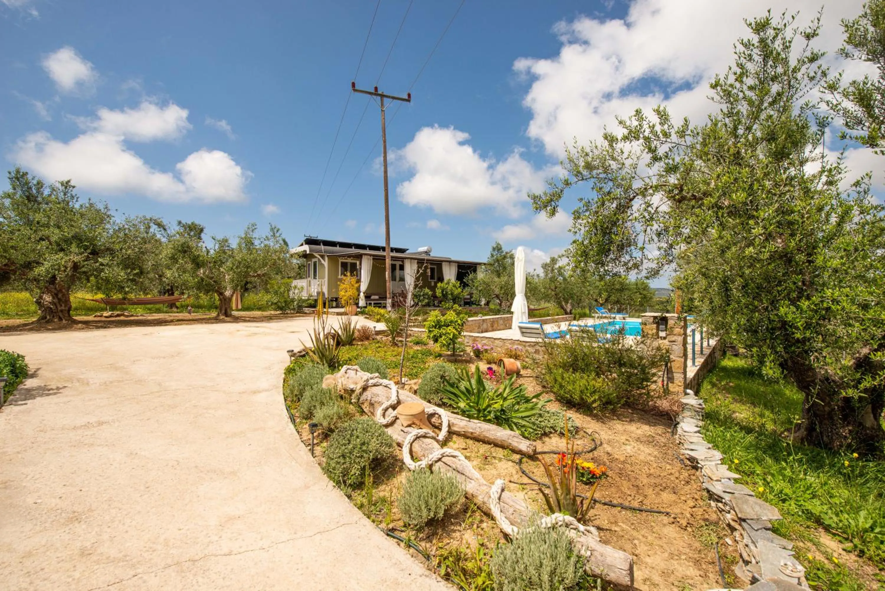 Property building in Hakuna Matata Holidays Agalia with airco & pool in Greek Olive Grove