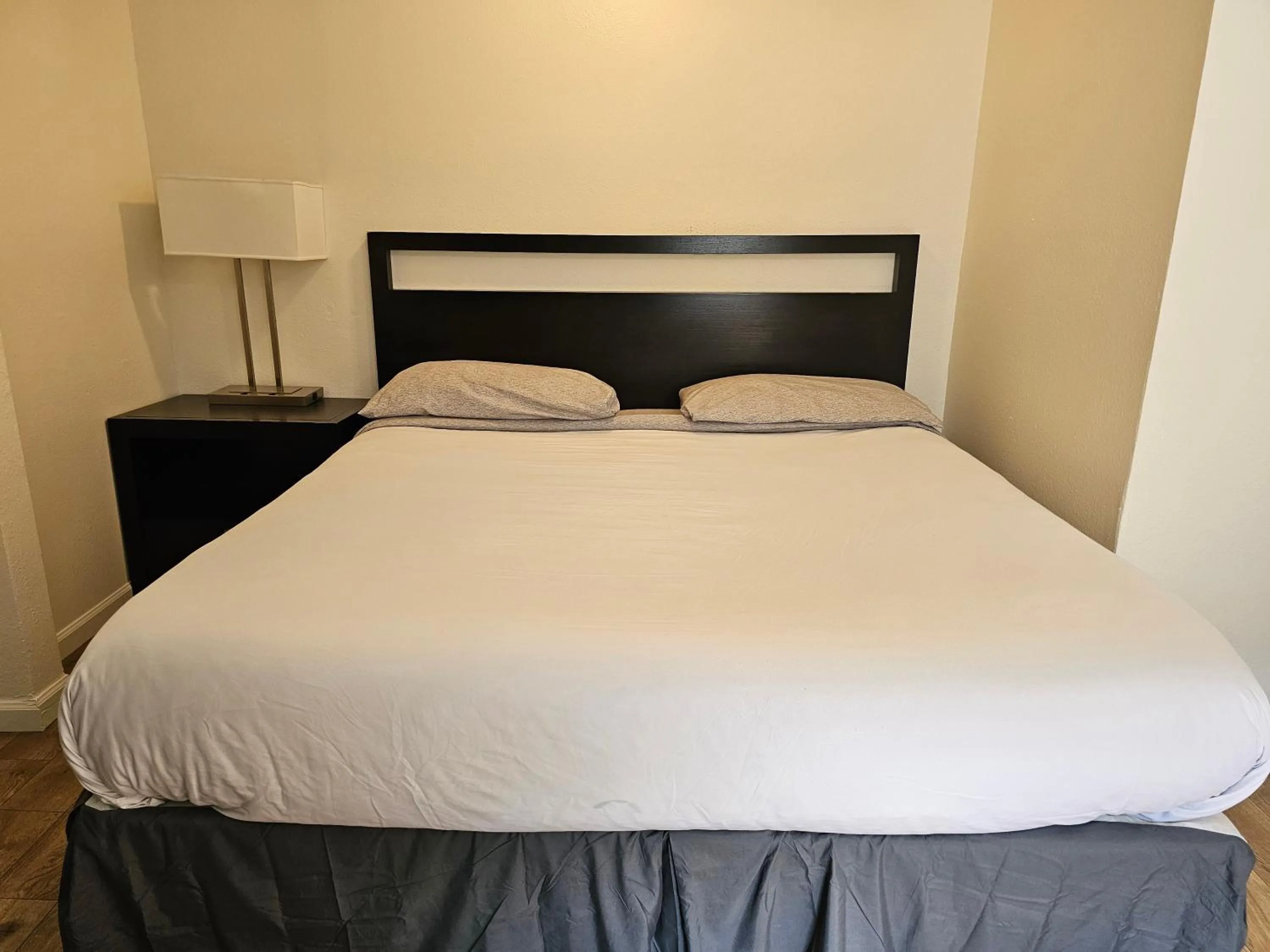 Bed in H&H Motor Lodge