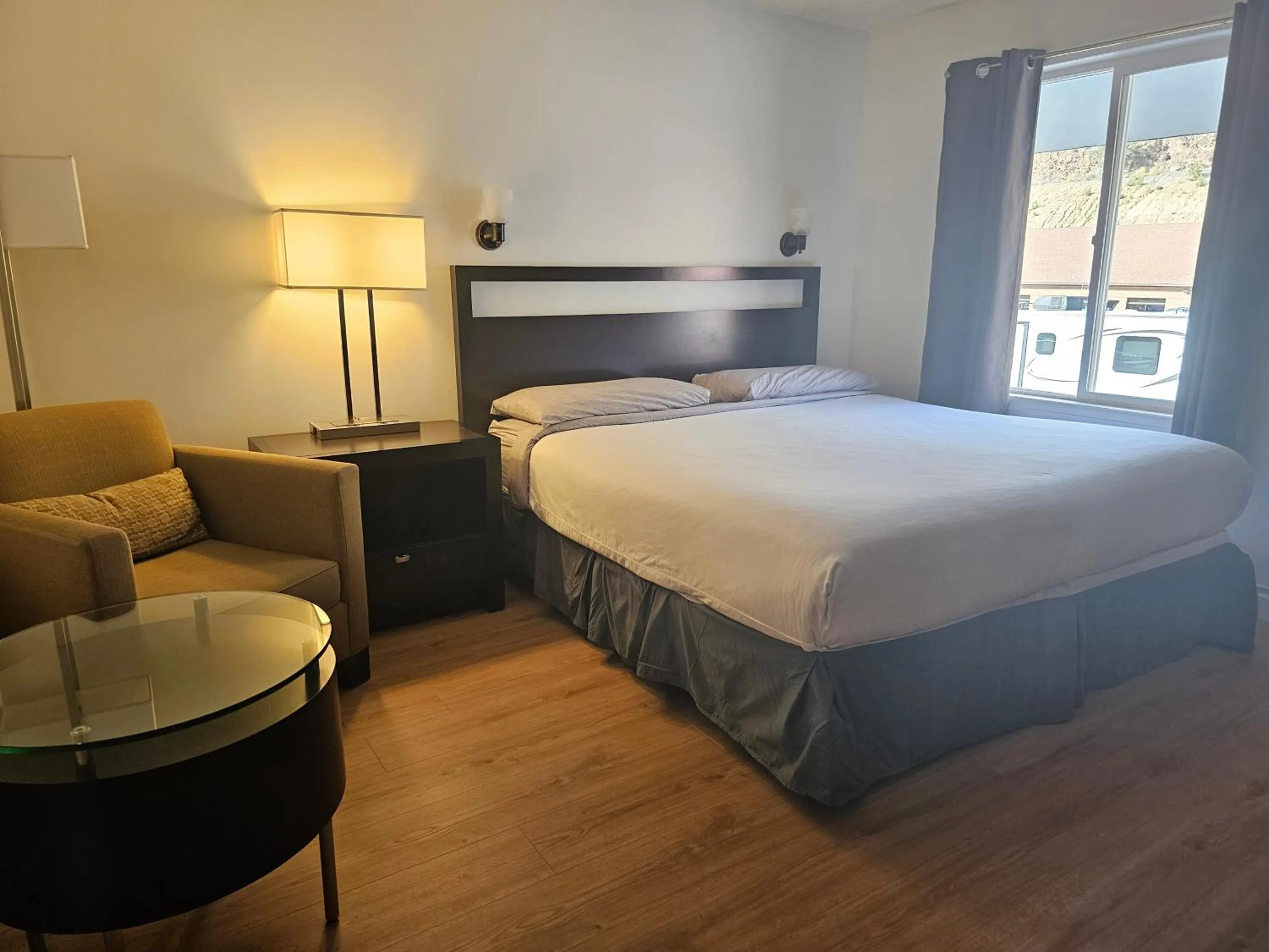 Bed in H&H Motor Lodge