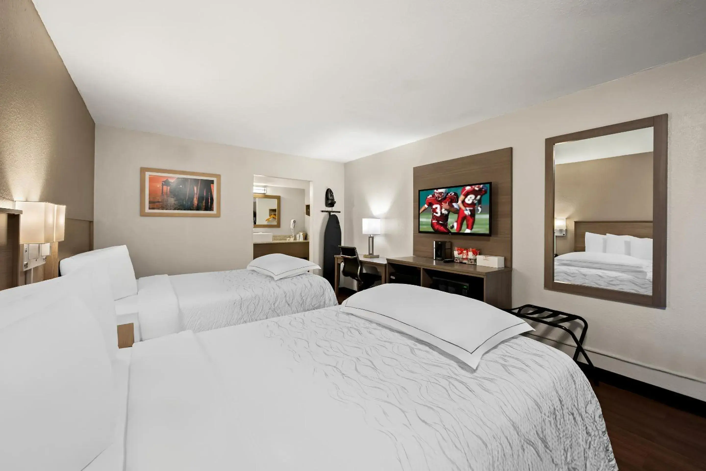 Bedroom, Bed in Red Roof Inn PLUS+ & Suites Naples Downtown-5th Ave S Bedroom, Bed in Red Roof Inn PLUS+ & Suites Naples Downtown-5th Ave S