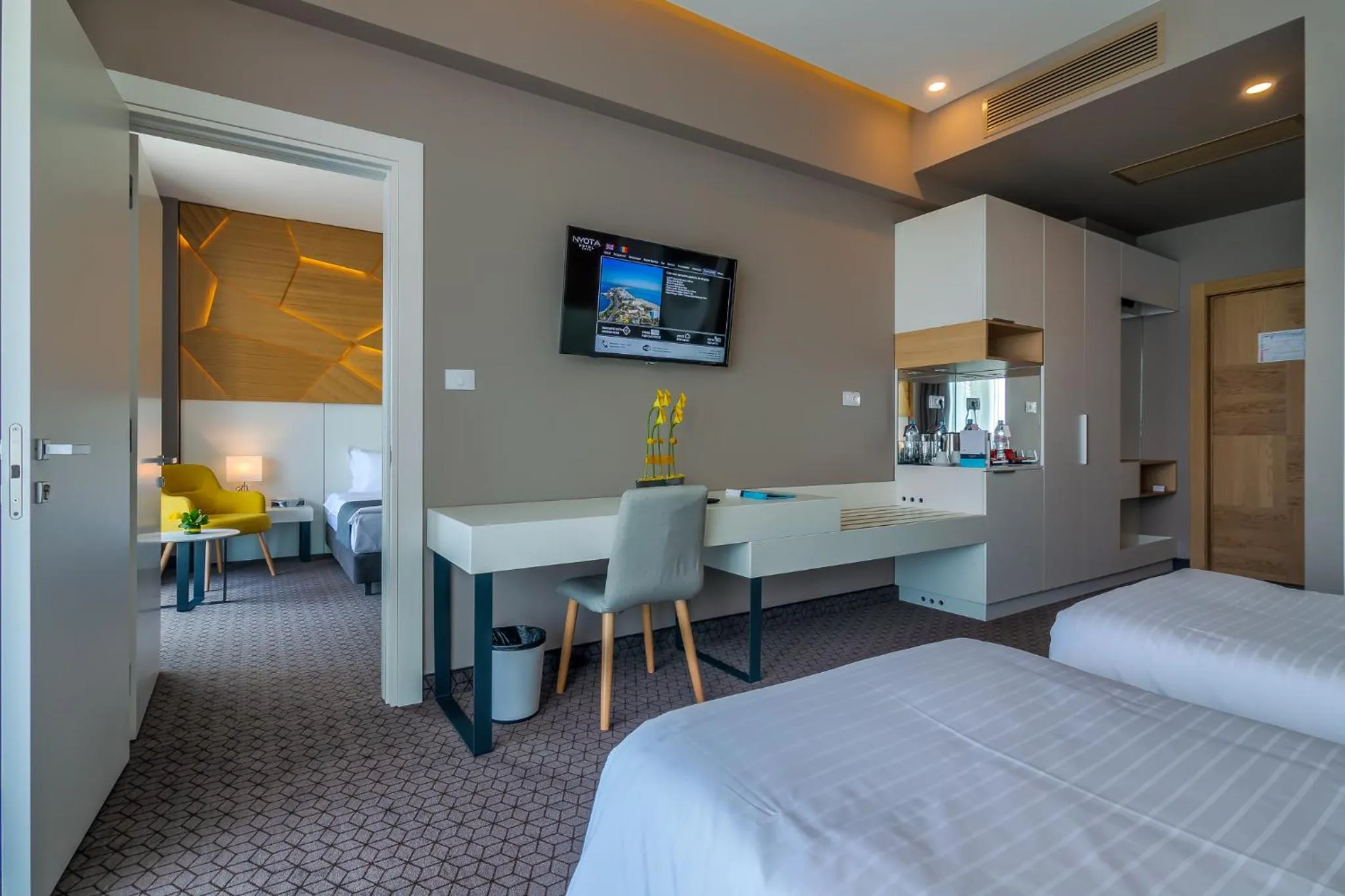 Bed in Nyota Hotel & Conference Center