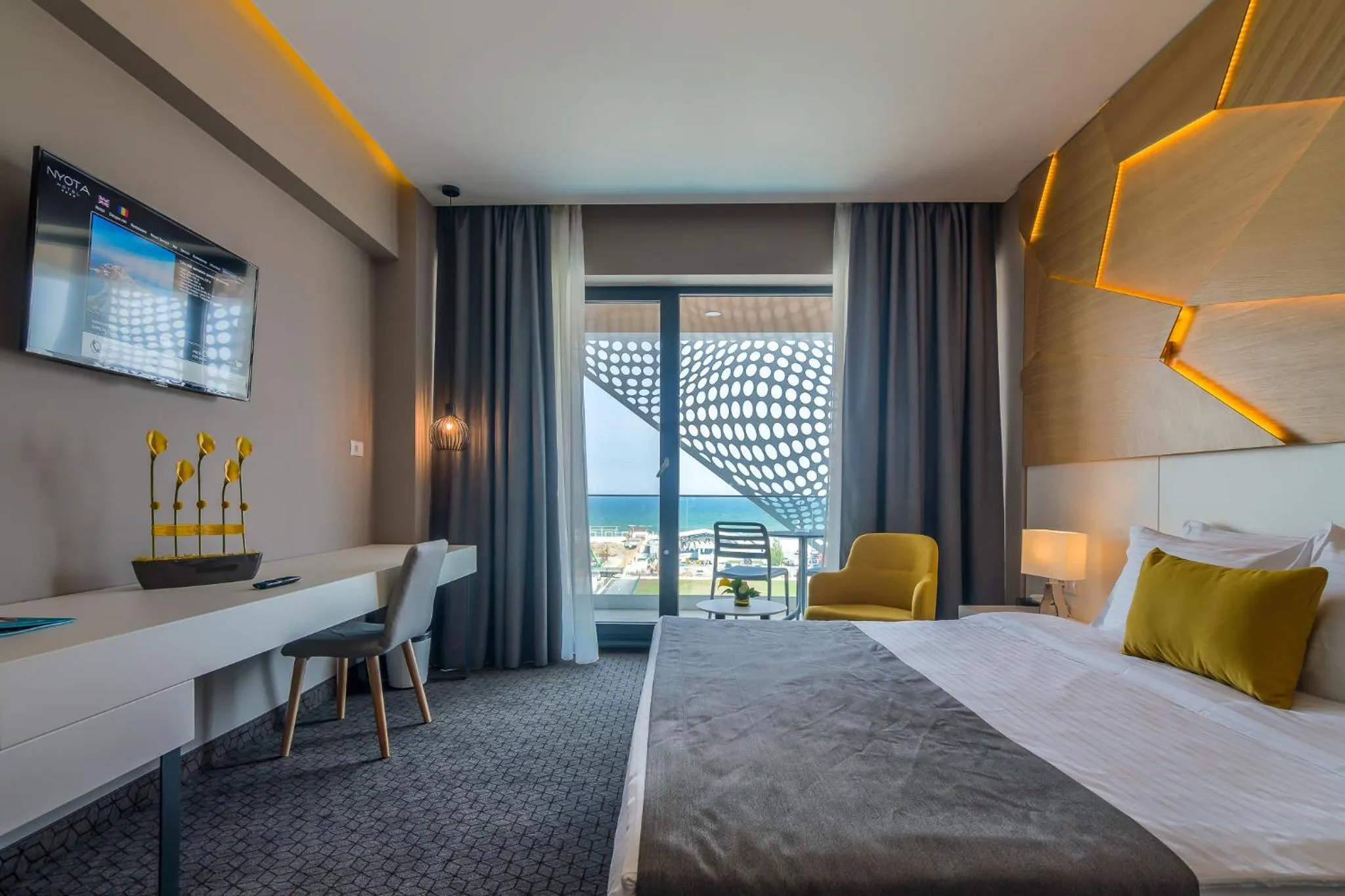 Bed in Nyota Hotel & Conference Center