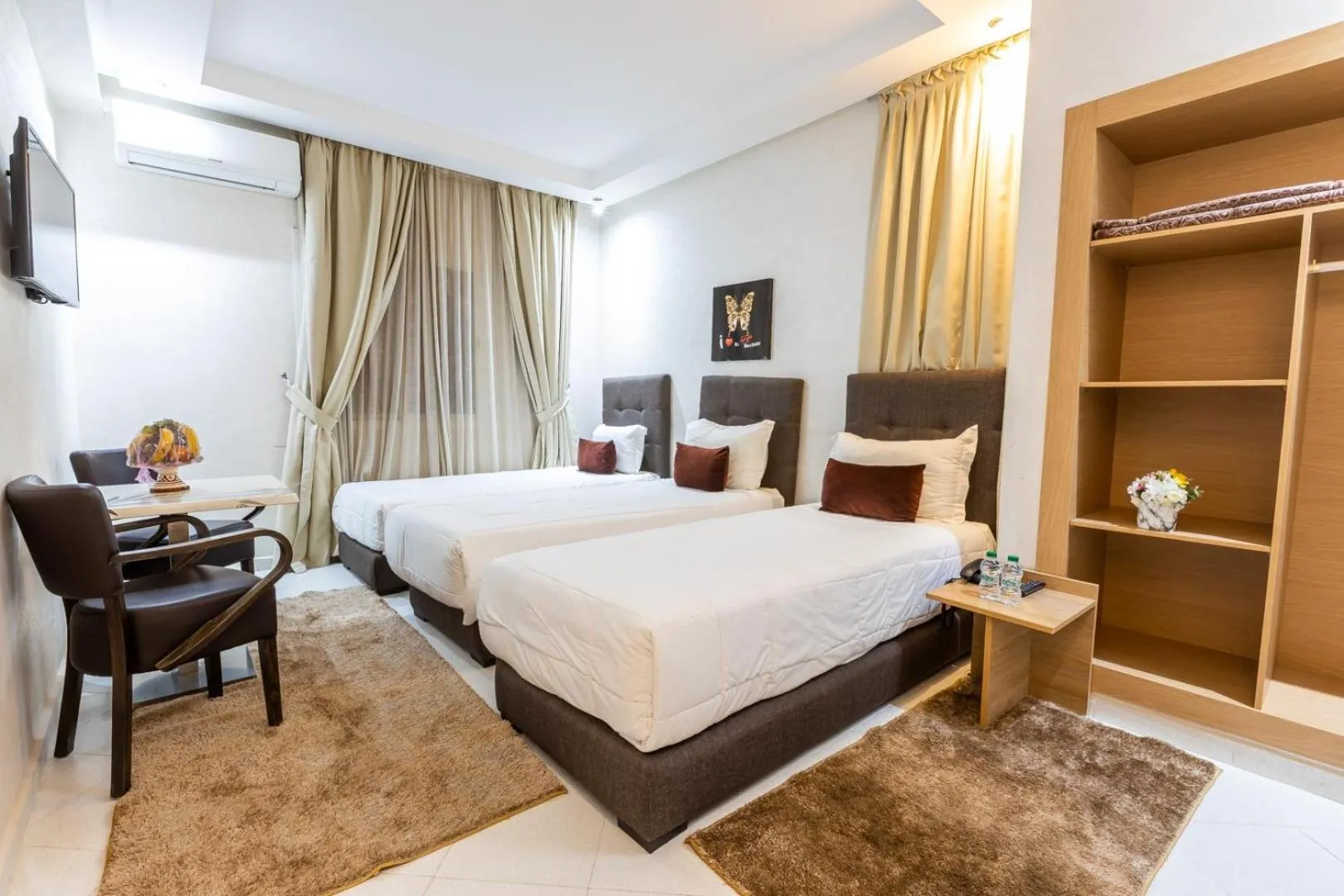 Bedroom in Hotel Hospitality-Inn City Center