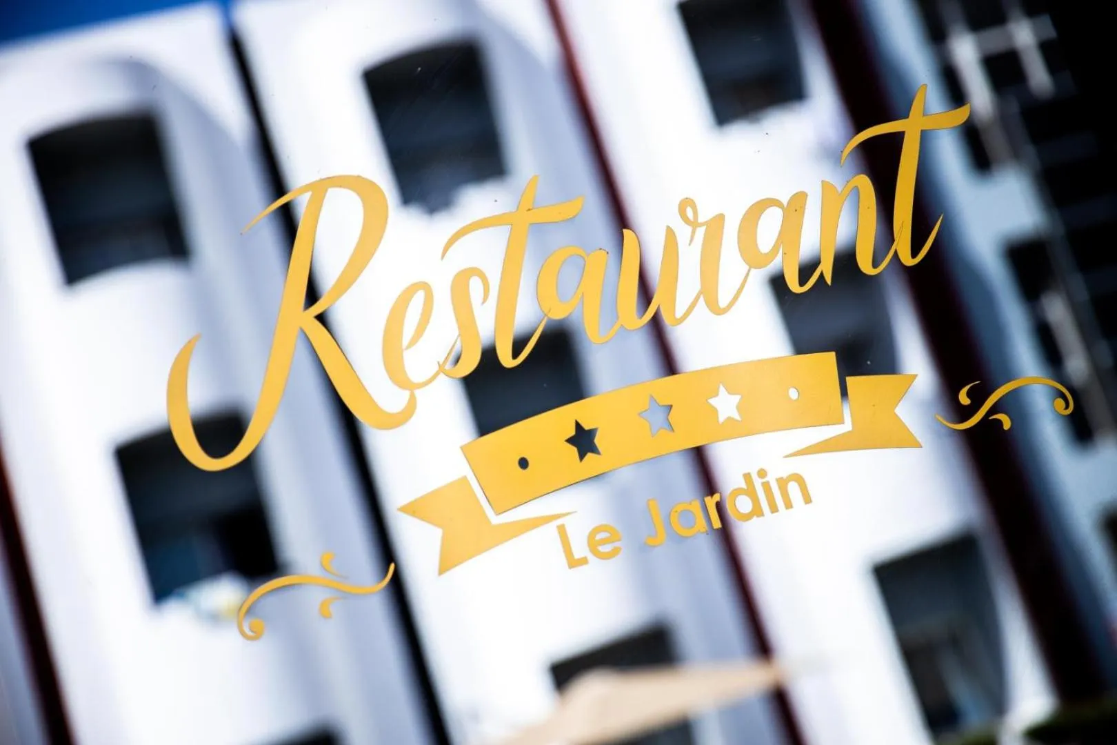 Property logo or sign in Hotel Hospitality-Inn City Center