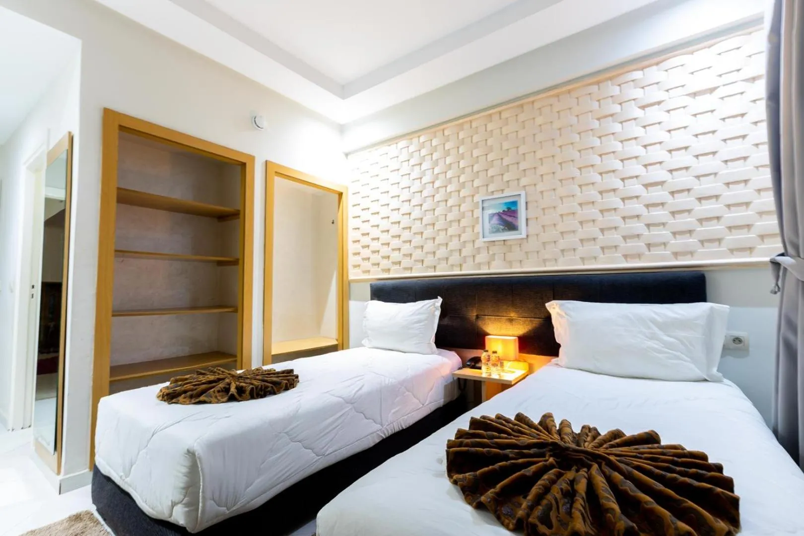 Bedroom in Hotel Hospitality-Inn City Center