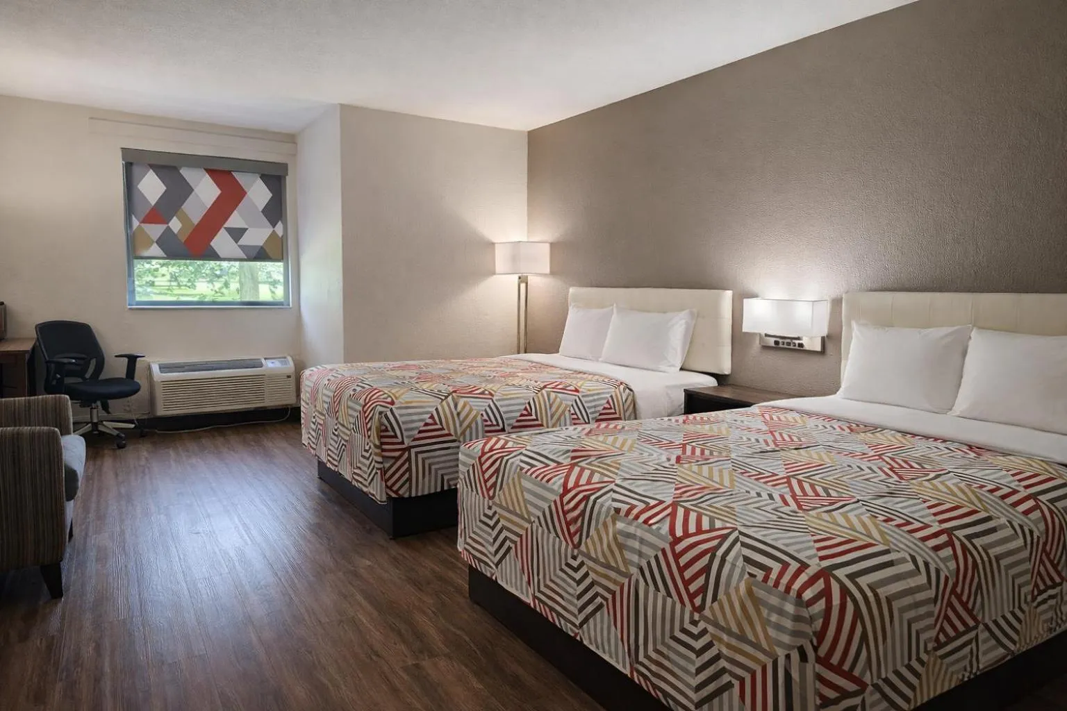 Bed in Motel 6 Lake City, FL – Medical Center