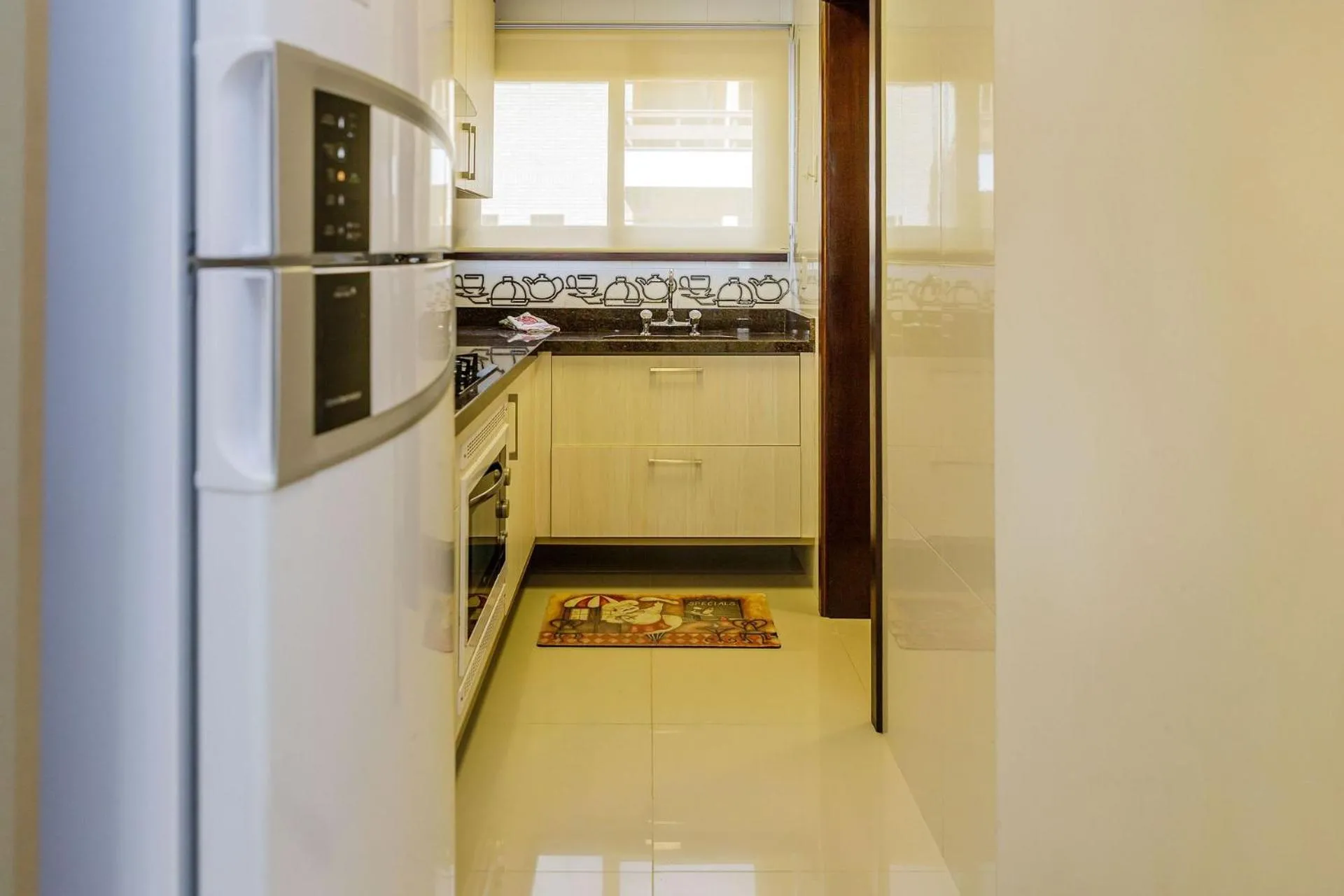 Kitchen or kitchenette in LOCAR-IN Gramado Residencial Siena Centro