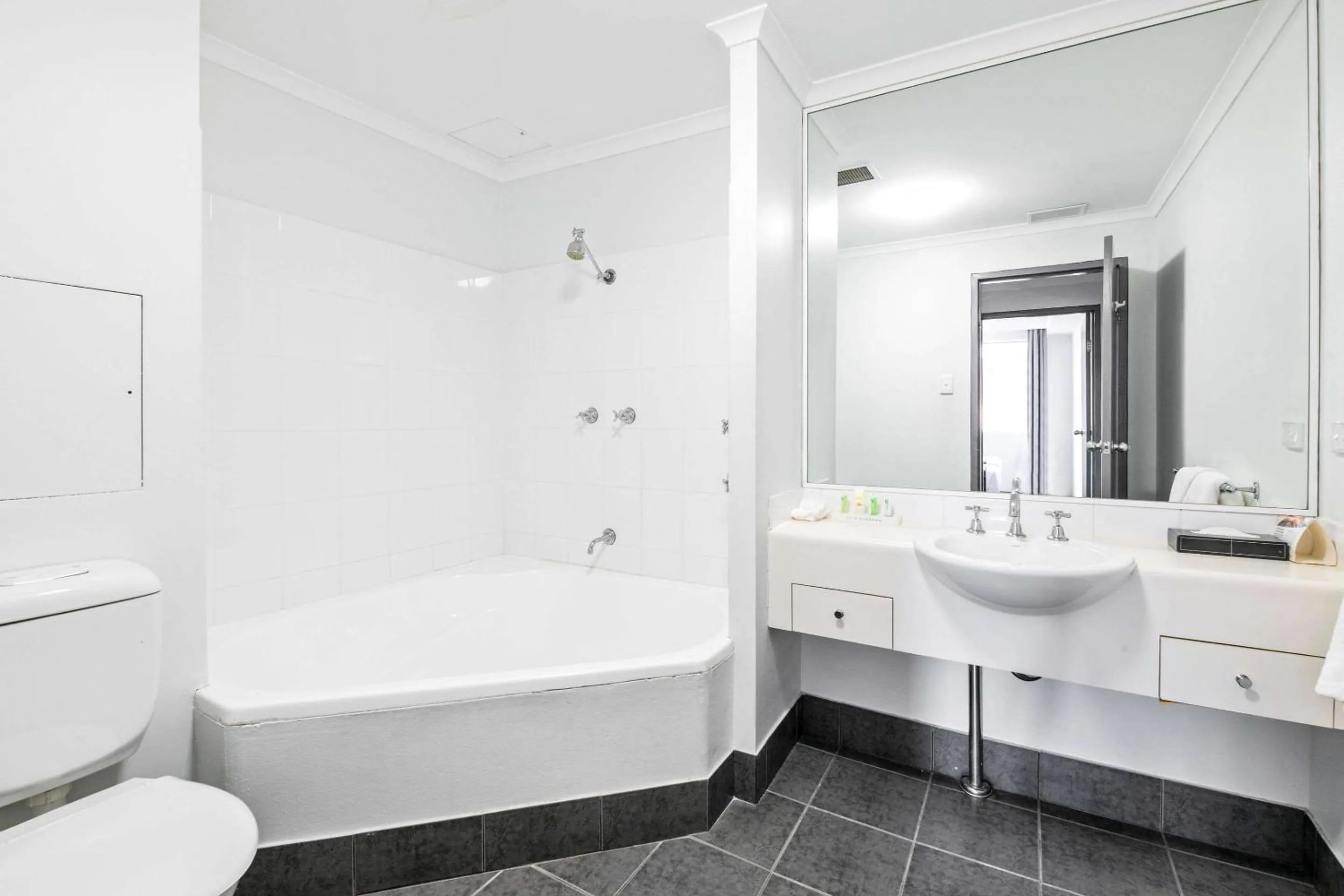 Photo of the whole room, Bathroom in Quality Apartments Camperdown