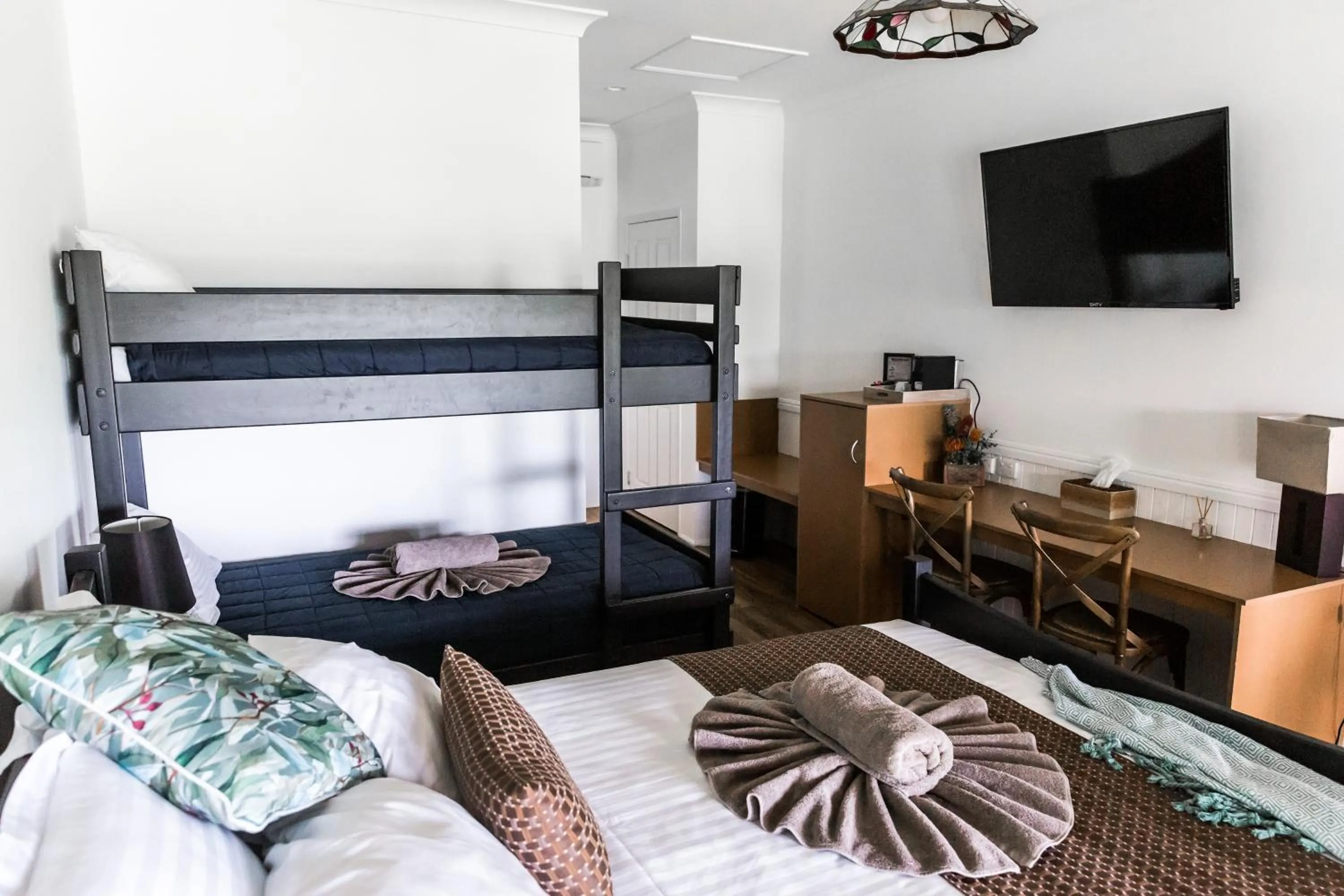 Bed in The Bearded Dragon Boutique Hotel