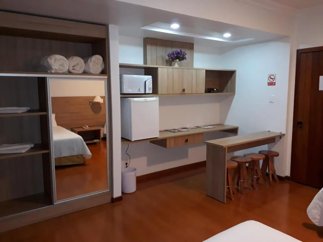 Kitchen or kitchenette, Bed in Hotel Solaris