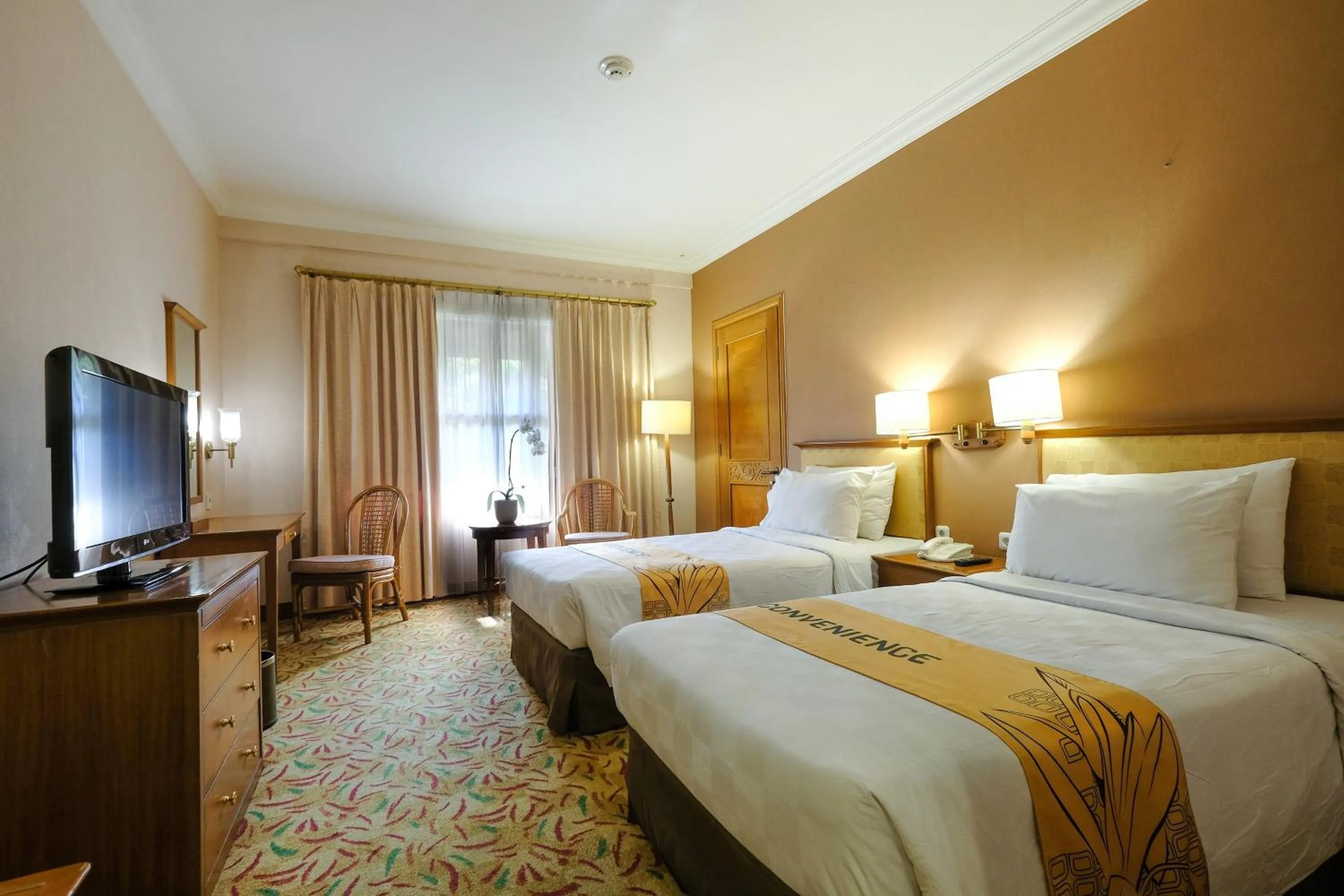 Bed in Loman Park Hotel Yogyakarta