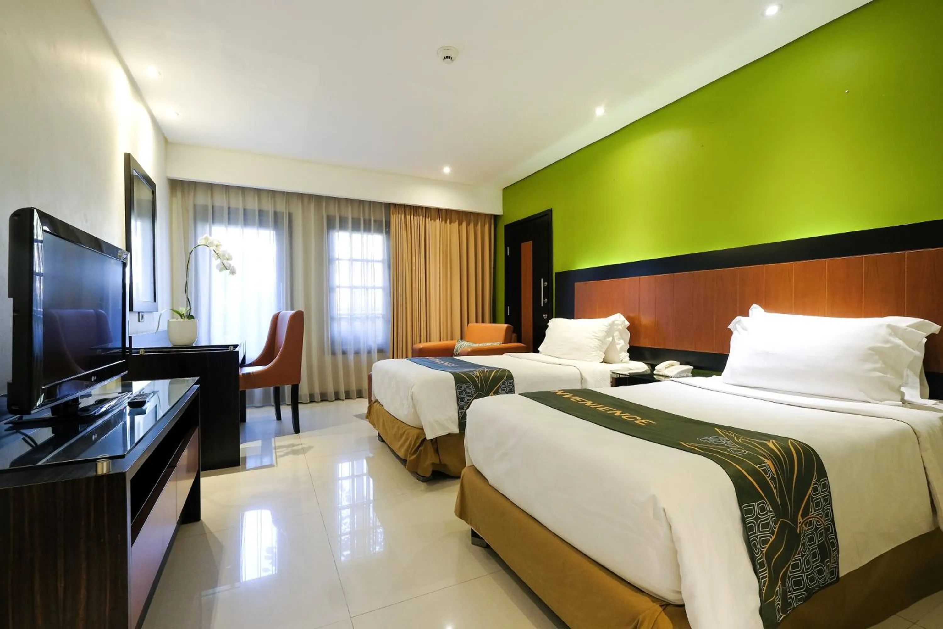 Bed in Loman Park Hotel Yogyakarta
