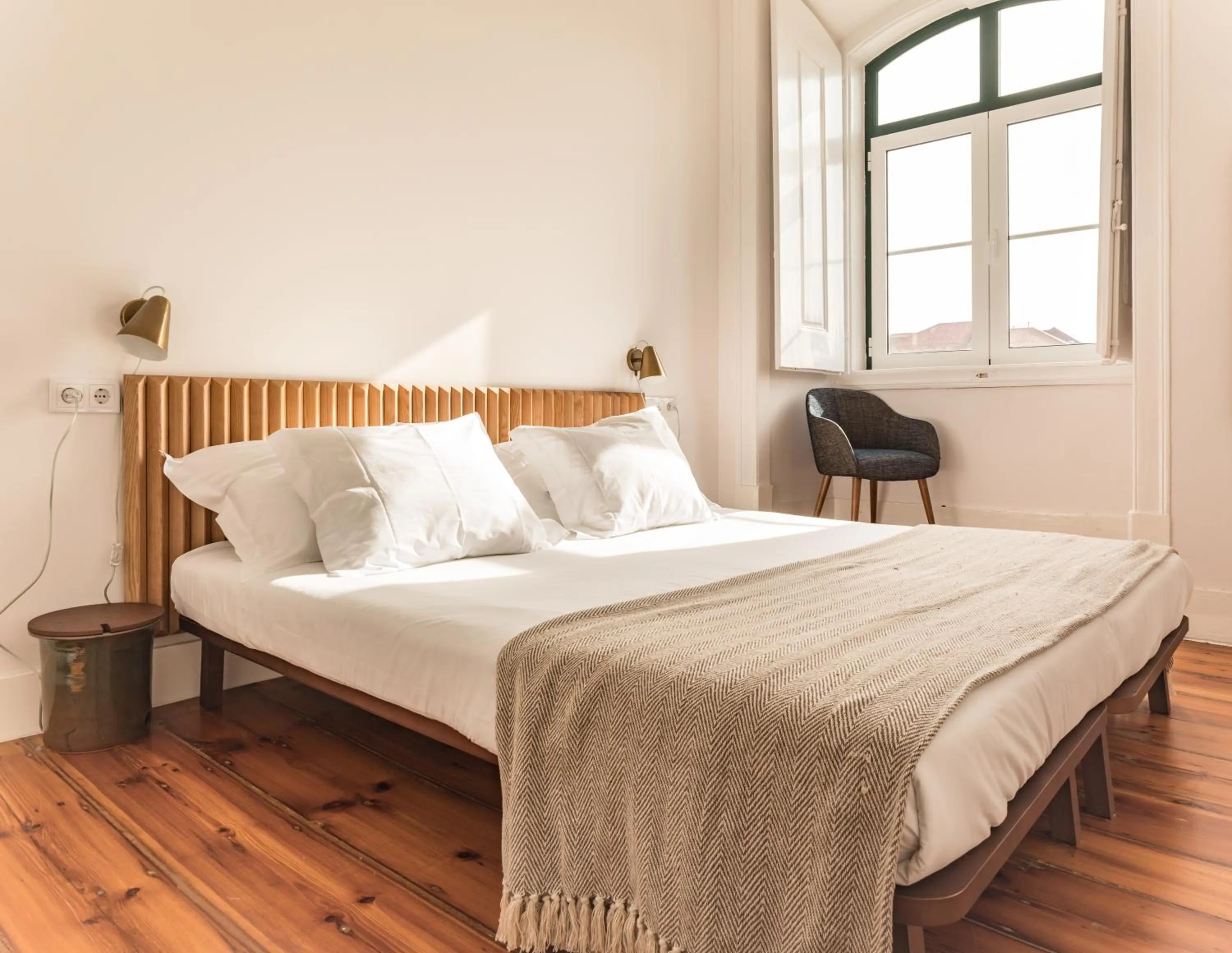 Bed in The Visionaire Apartments